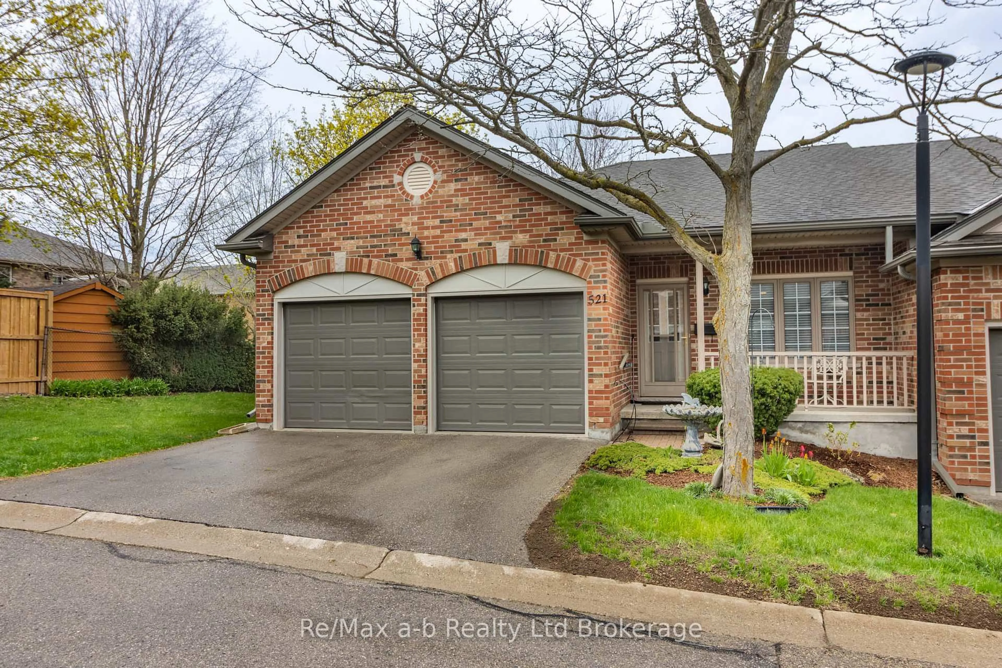 Home with brick exterior material, street for 521 Nova Scotia Crt #14, Woodstock Ontario N4S 8Z3