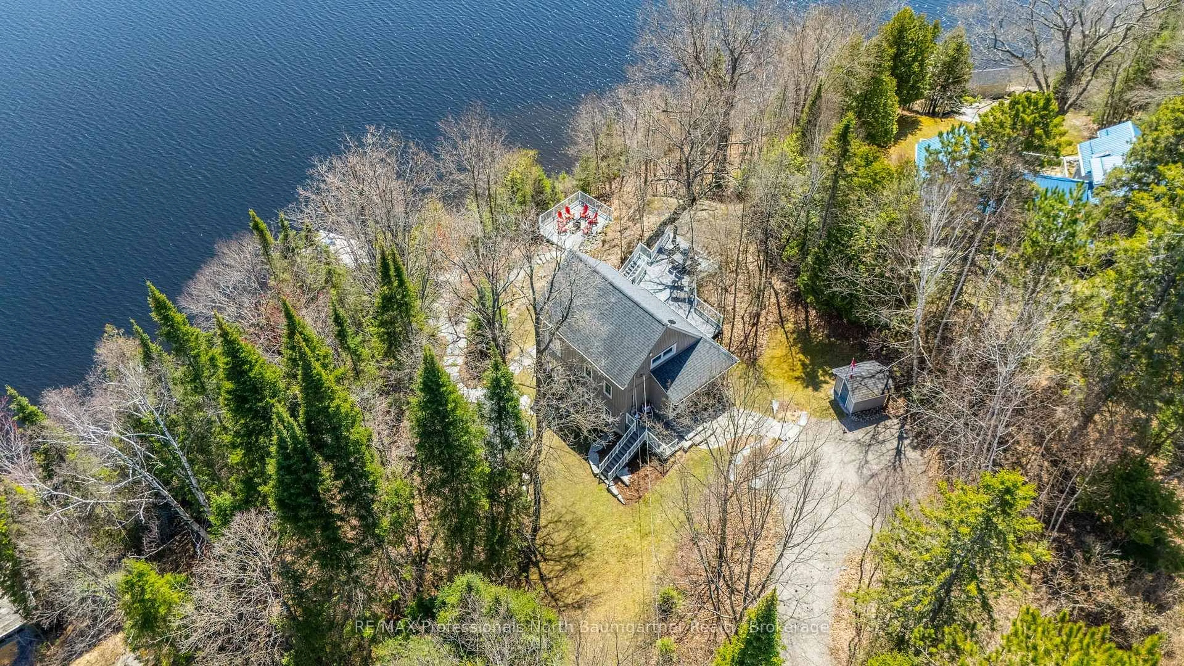 A pic from outside/outdoor area/front of a property/back of a property/a pic from drone, water/lake/river/ocean view for 1025 Yukon Tr, Minden Hills Ontario K0M 2K0