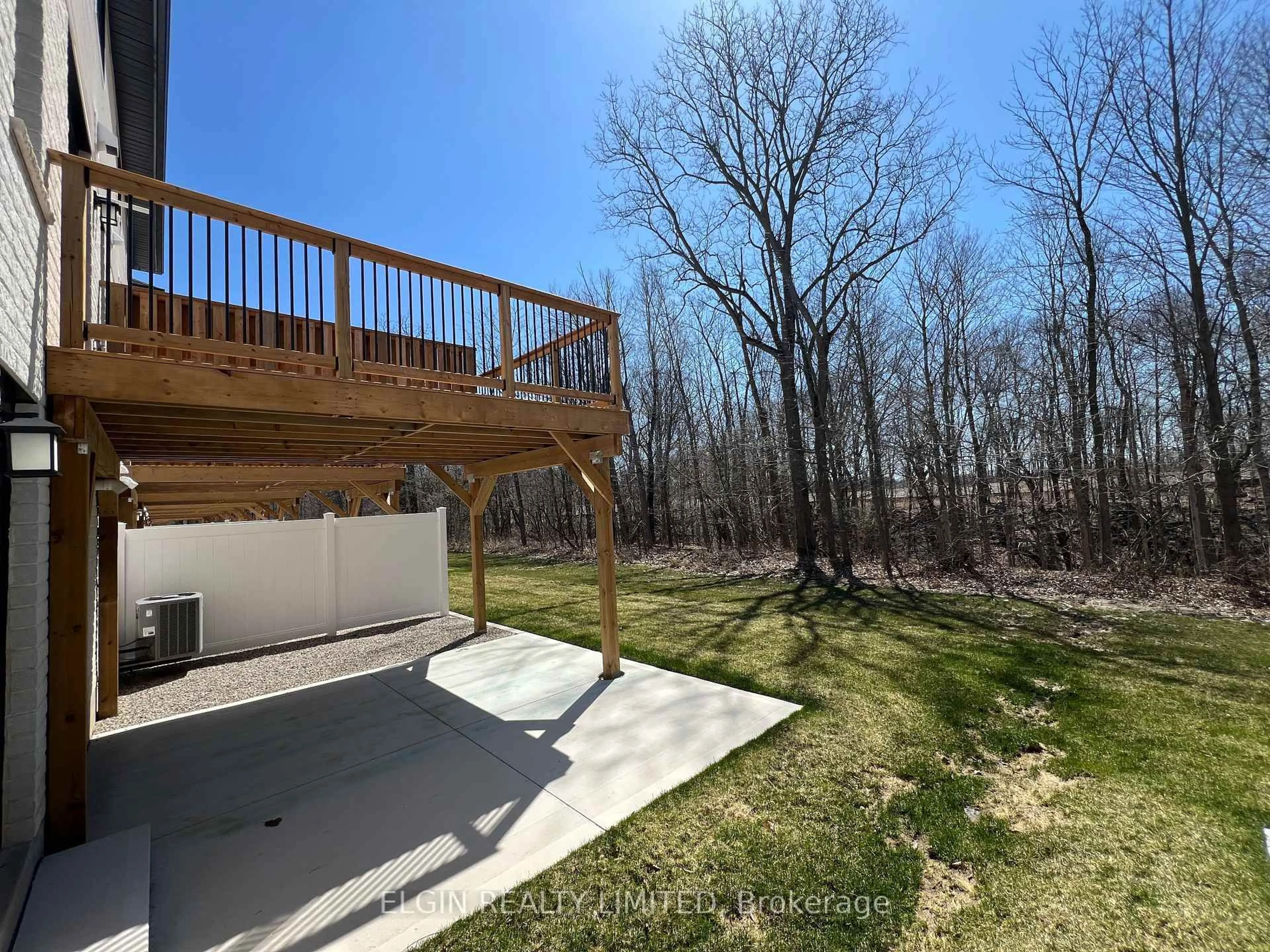 A pic from outside/outdoor area/front of a property/back of a property/a pic from drone, forest/trees view for 25-49 Royal Dornoch Dr, St. Thomas Ontario N5R 0P4