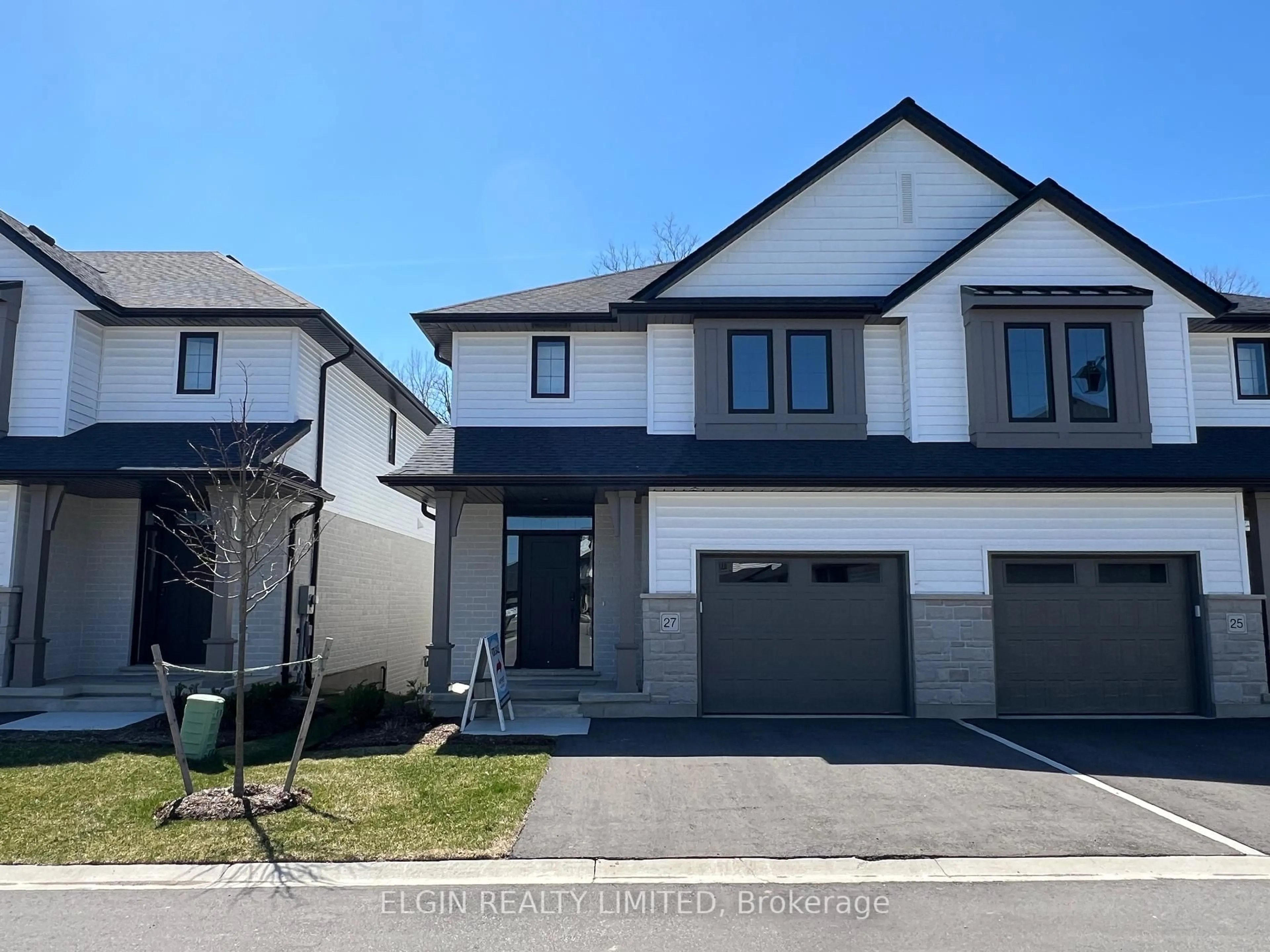 Home with vinyl exterior material, street for 27-49 Royal Dornoch Dr, St. Thomas Ontario N5R 0P4