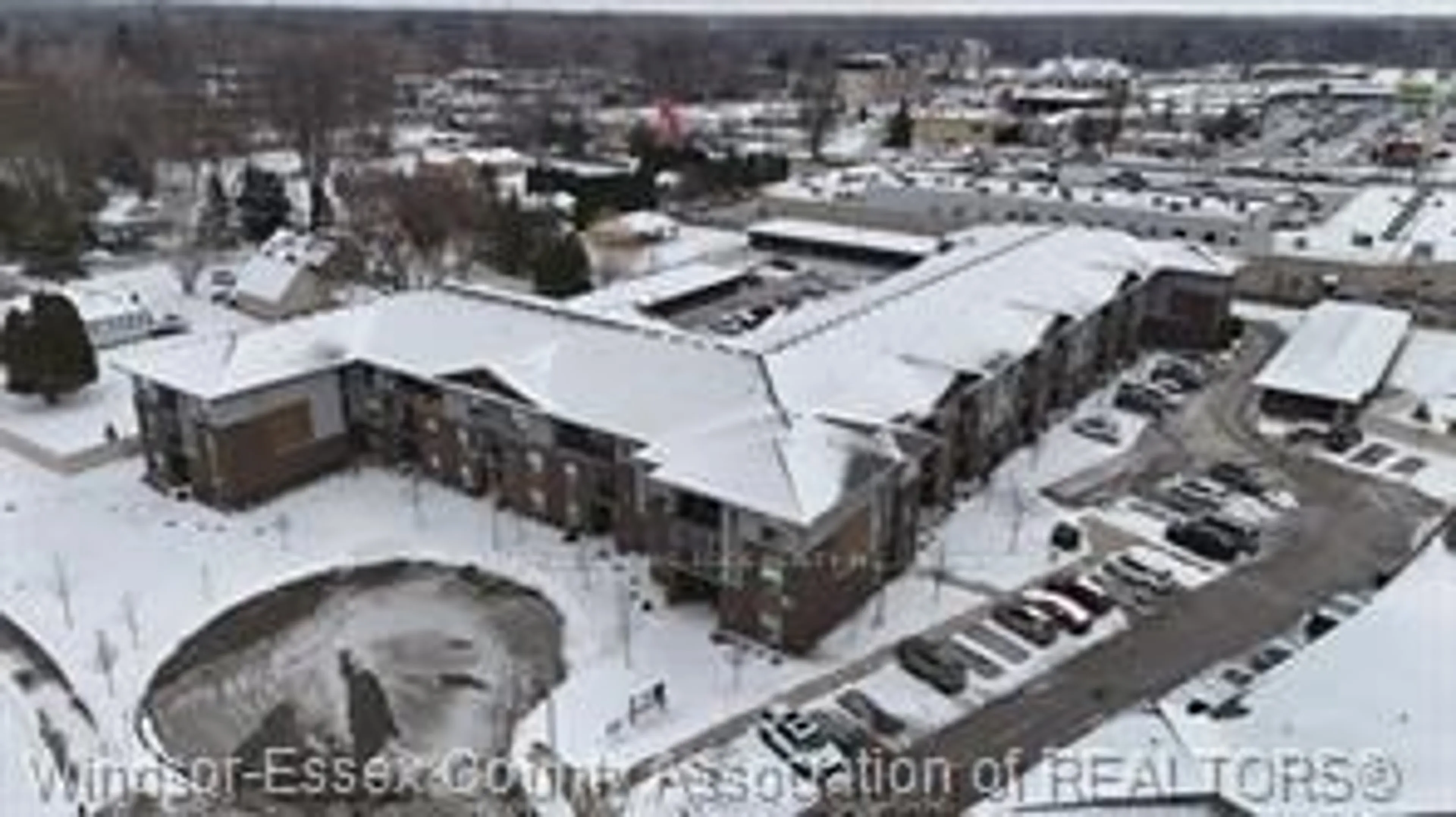 A pic from outside/outdoor area/front of a property/back of a property/a pic from drone, building for 5840 Newman Blvd #311, LaSalle Ontario N9J 0E3