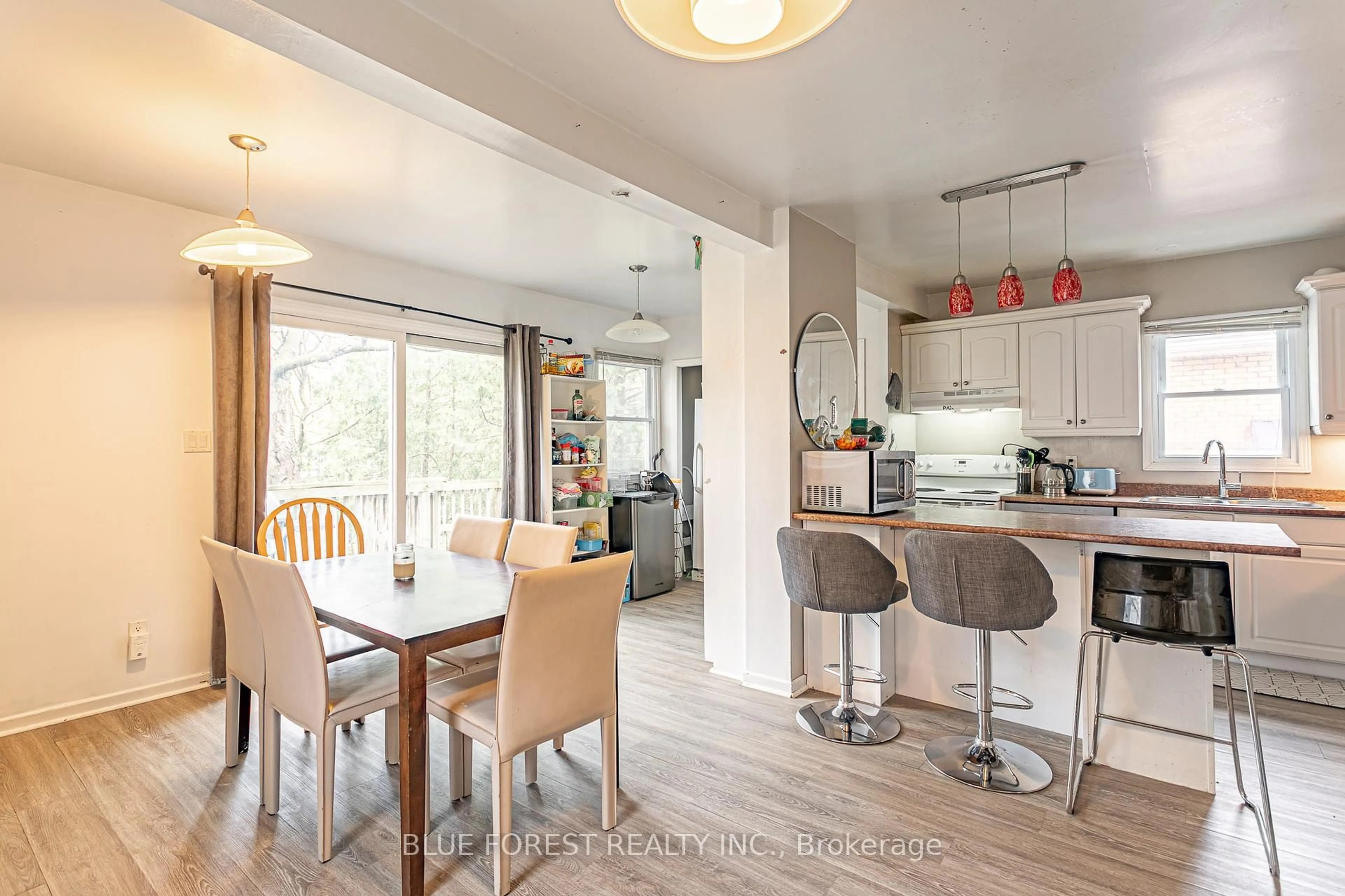 Open concept kitchen, wood/laminate floor for 232 Bernard Ave, London East Ontario N6A 2M8