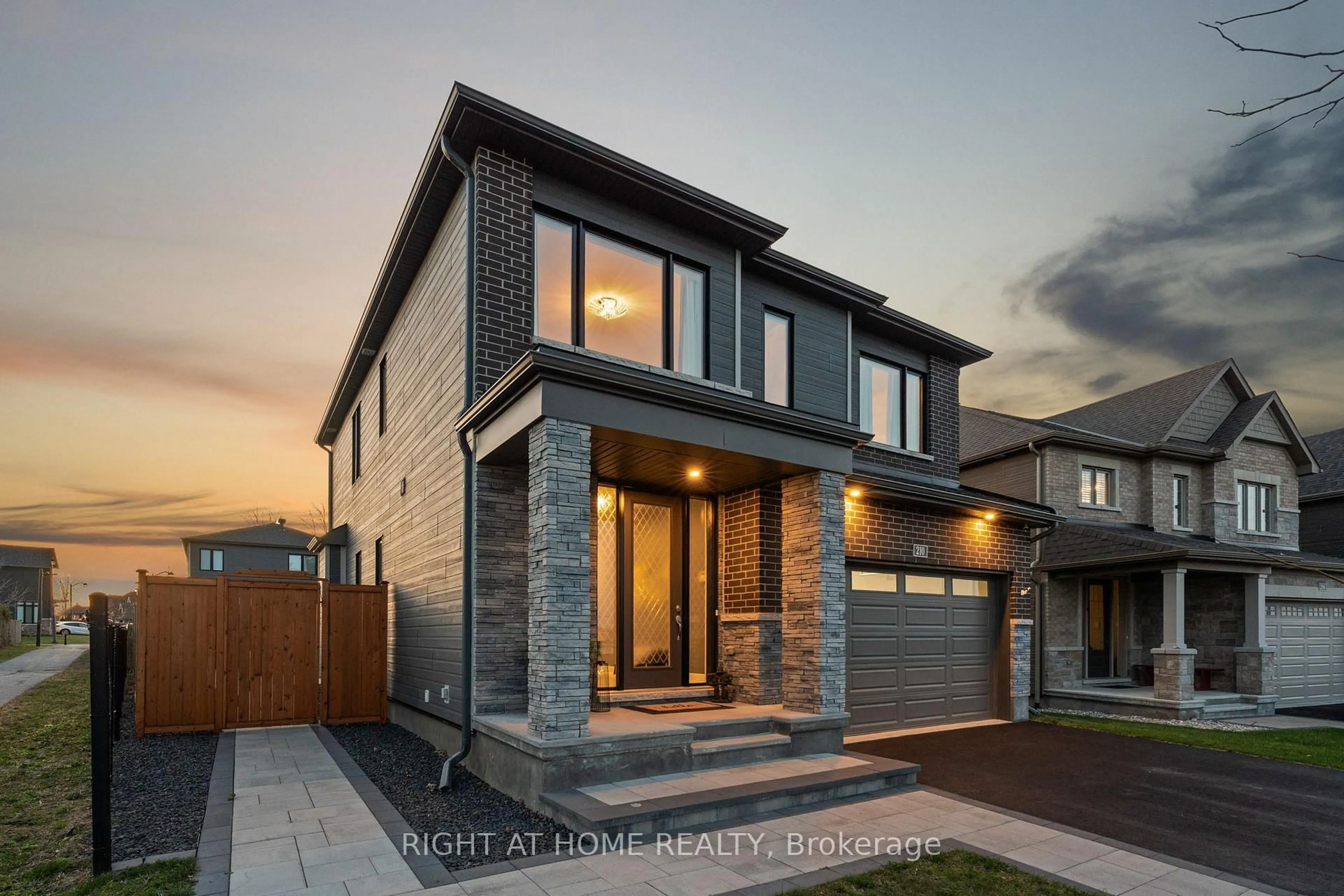 Home with brick exterior material, street for 210 Spindrift Circ, Manotick Ontario K4M 1J8