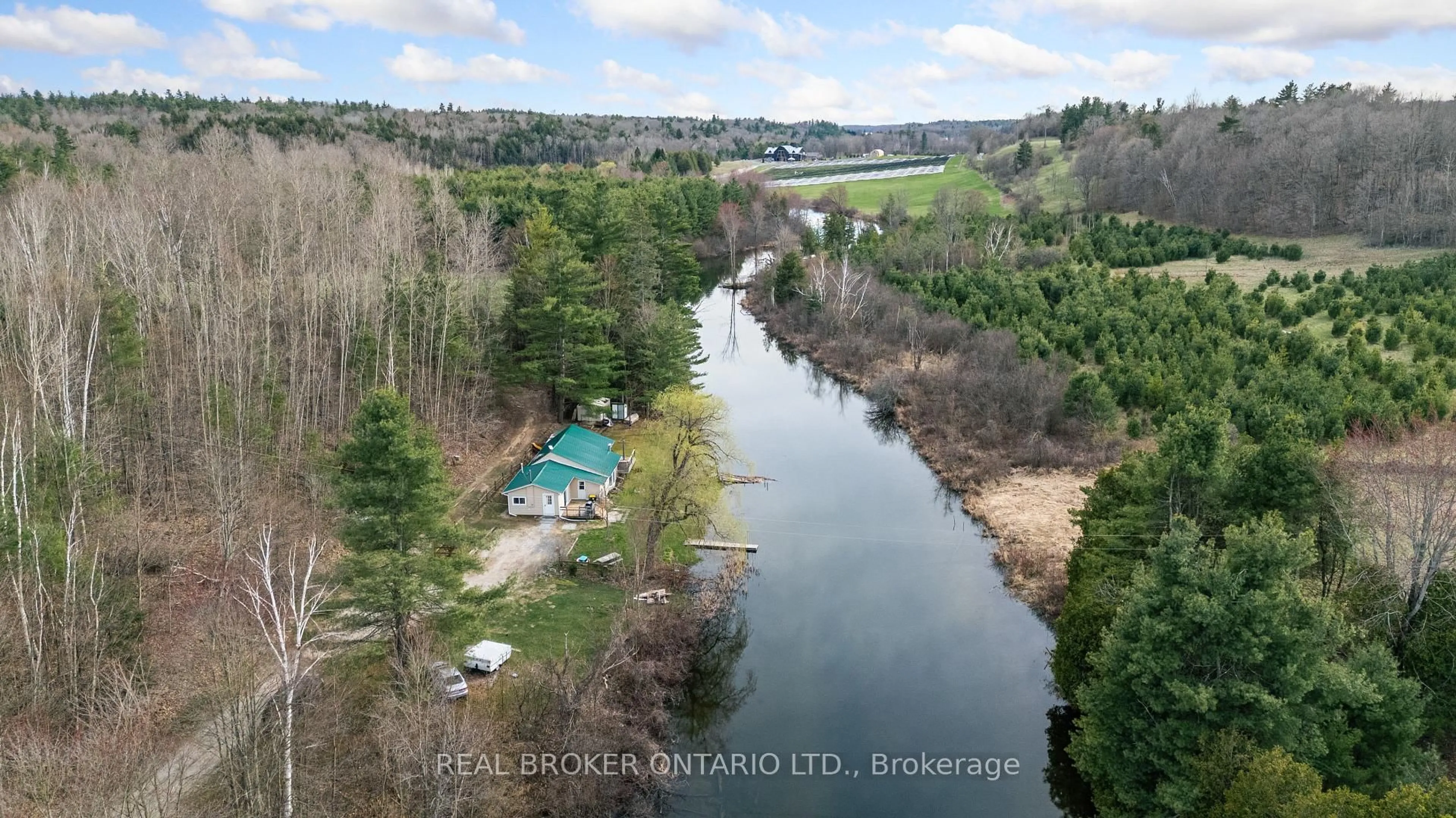 A pic from outside/outdoor area/front of a property/back of a property/a pic from drone, water/lake/river/ocean view for 3385 Bolingbroke Rd, Maberly Ontario K0H 2B0