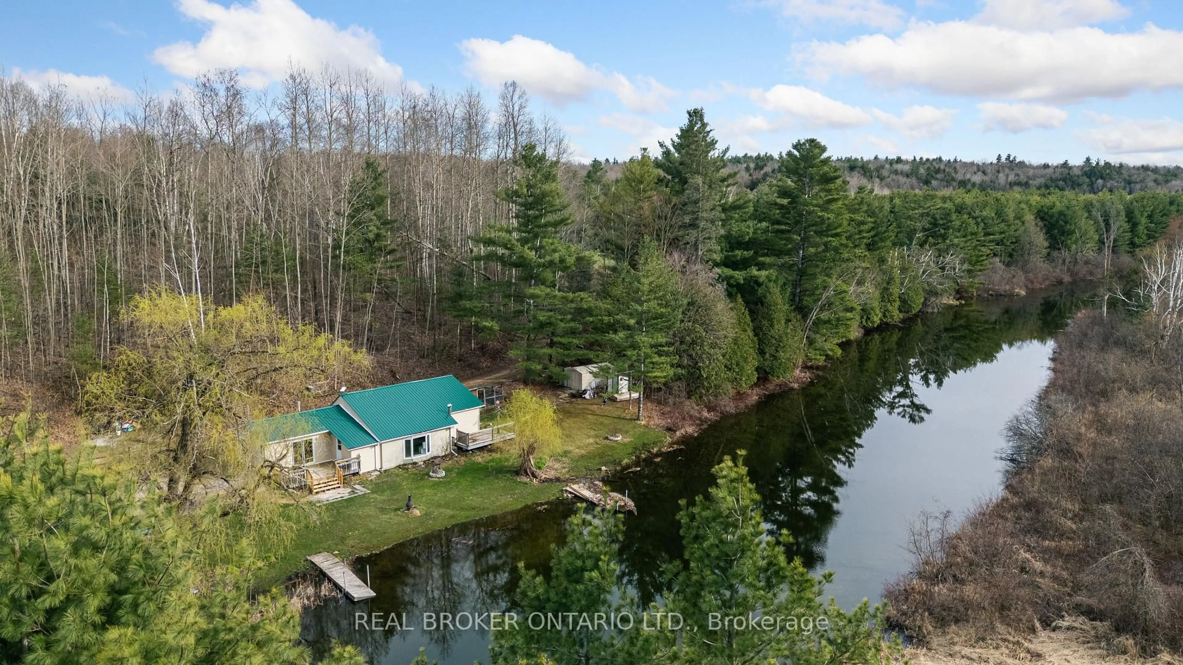 A pic from outside/outdoor area/front of a property/back of a property/a pic from drone, water/lake/river/ocean view for 3385 Bolingbroke Rd, Maberly Ontario K0H 2B0