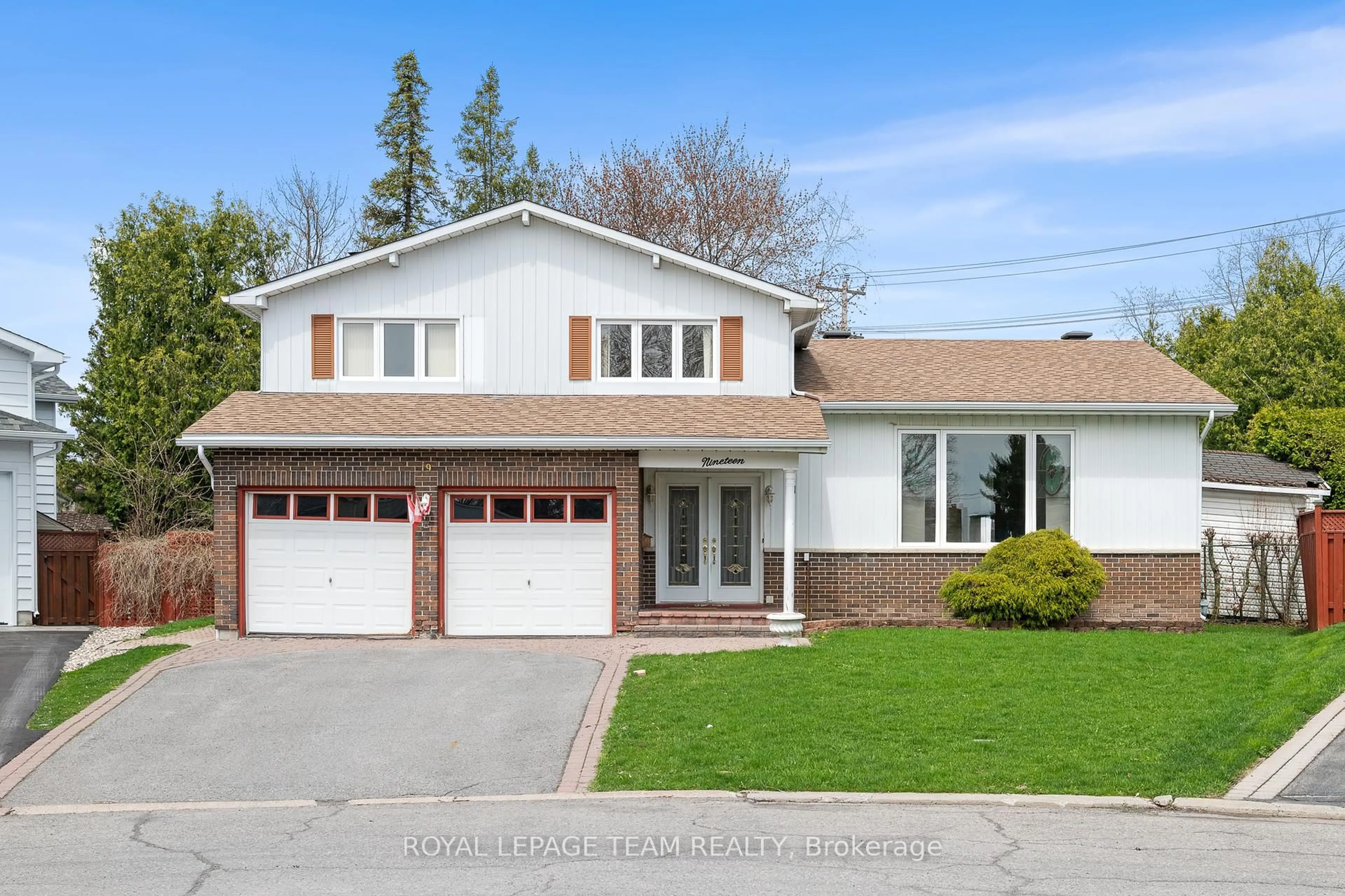 Home with brick exterior material, street for 19 Parklane Crt, Ottawa Ontario K1B 3H3