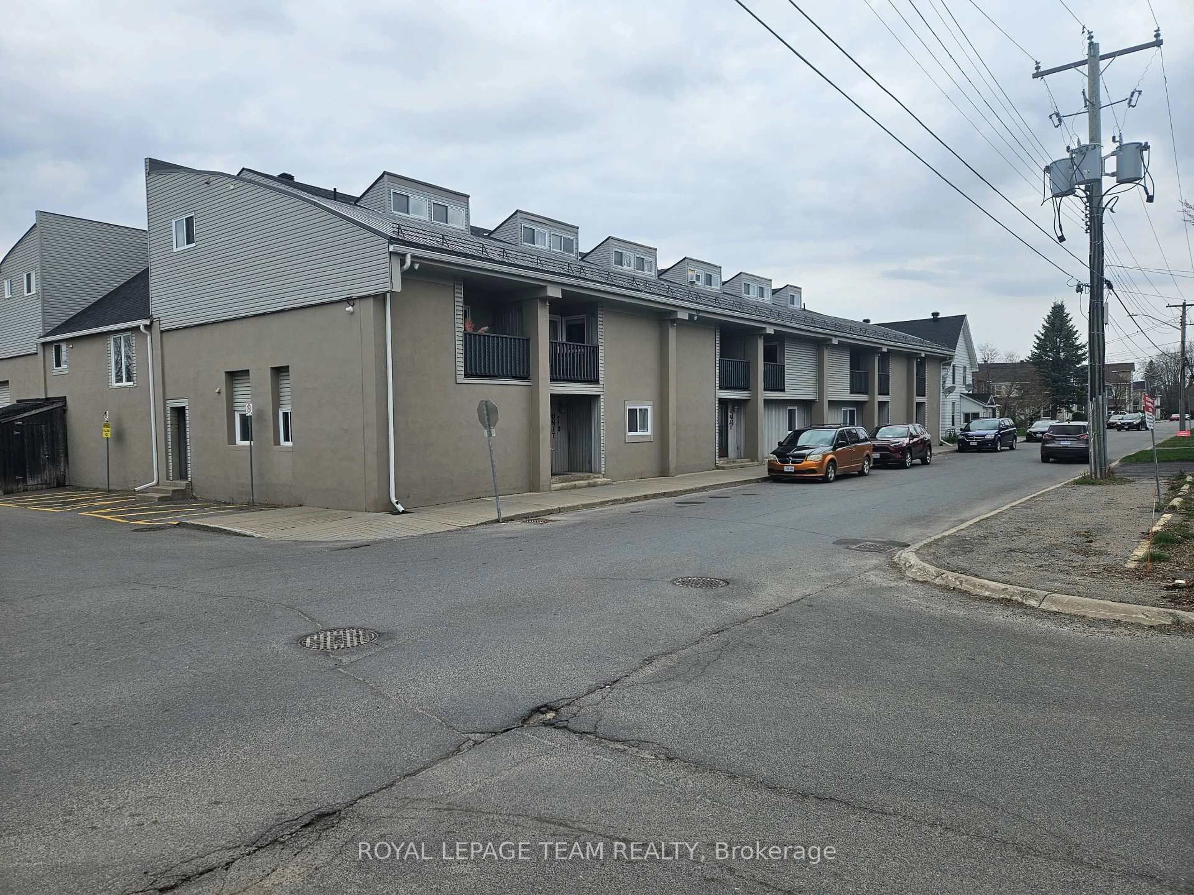 A pic from outside/outdoor area/front of a property/back of a property/a pic from drone, street for 105 Asa St #202, North Grenville Ontario K0G 1J0