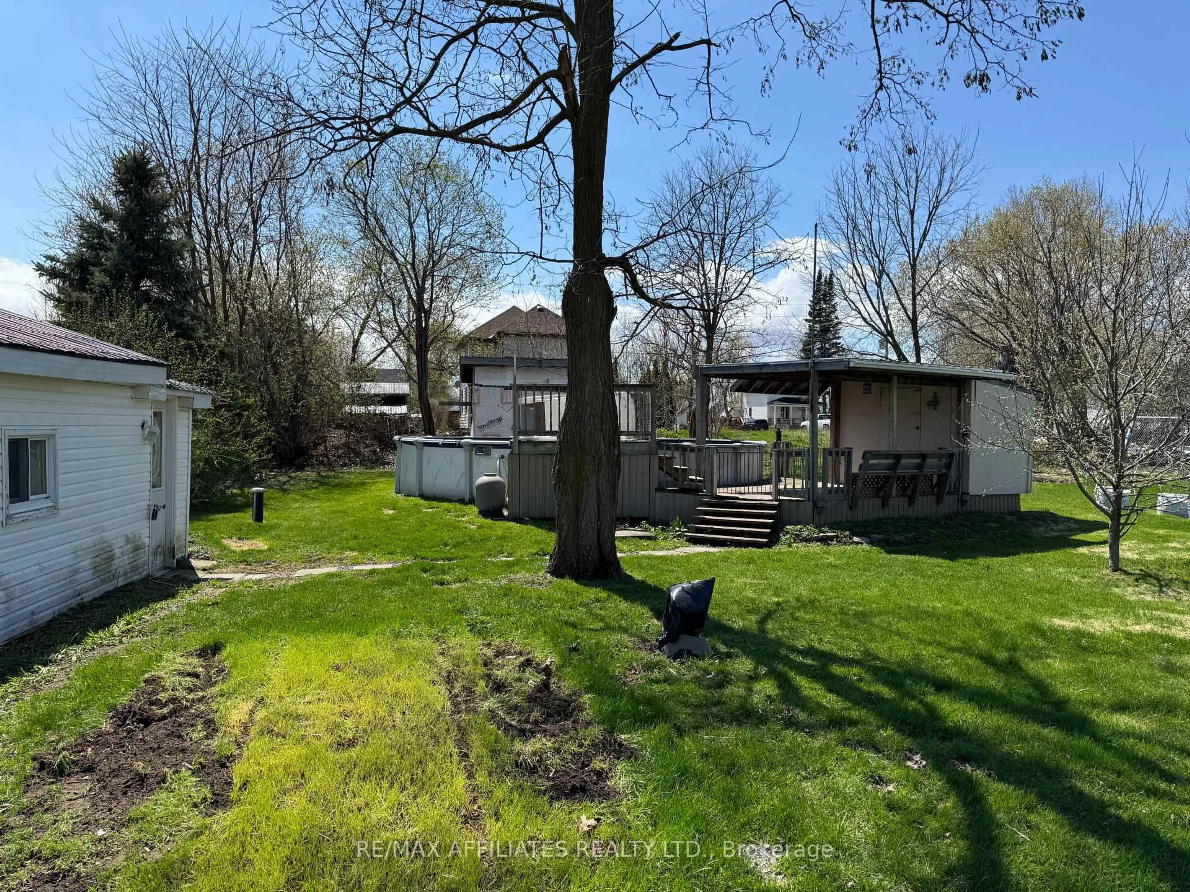 A pic from outside/outdoor area/front of a property/back of a property/a pic from drone, forest/trees view for 10 Charlotte St, Montague Ontario K7A 2X7