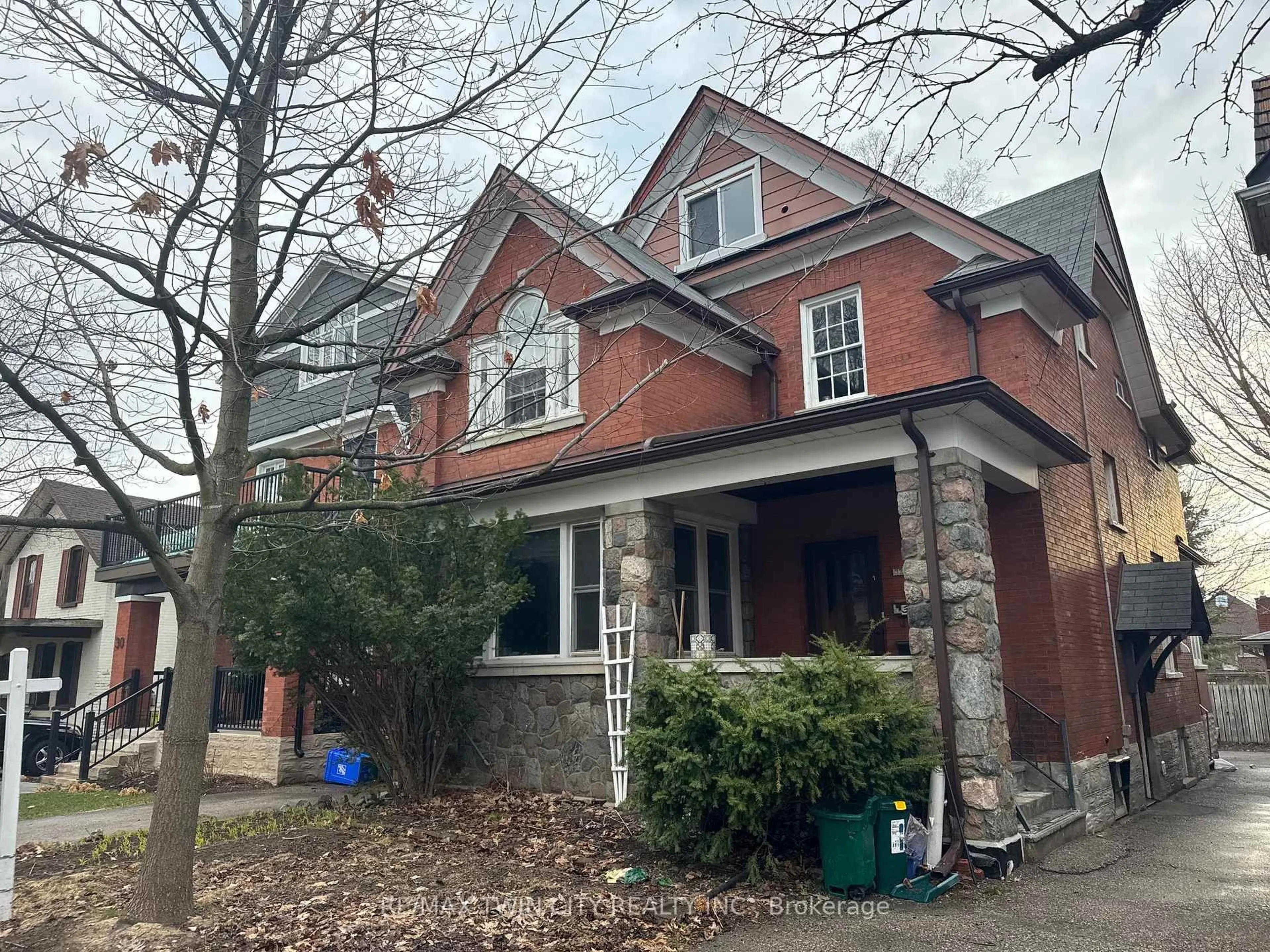 Home with brick exterior material, street for 32 Simeon St, Kitchener Ontario N2H 1S1