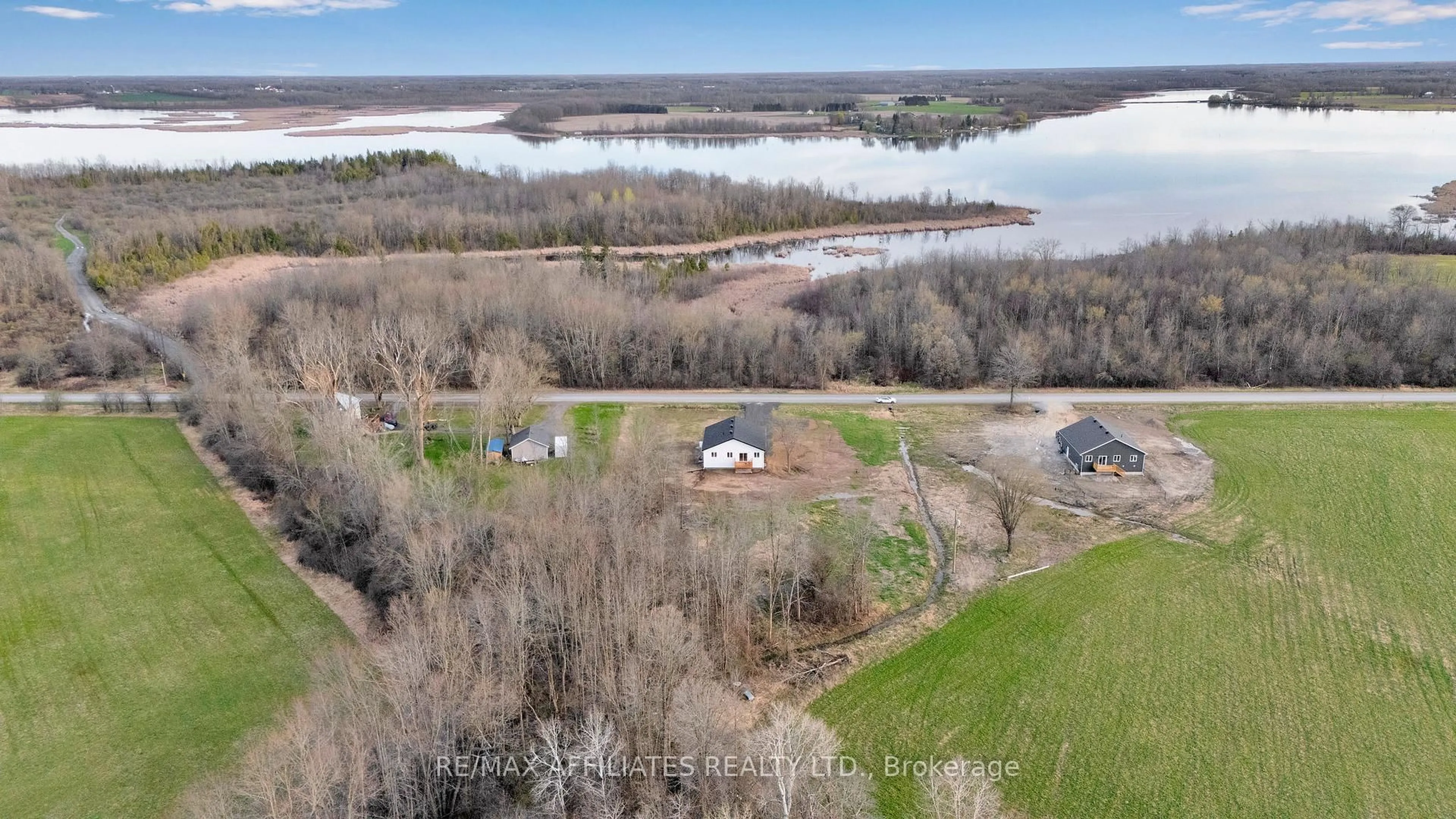 A pic from outside/outdoor area/front of a property/back of a property/a pic from drone, water/lake/river/ocean view for 1146 Rideau River Rd, Merrickville Ontario K0G 1N0