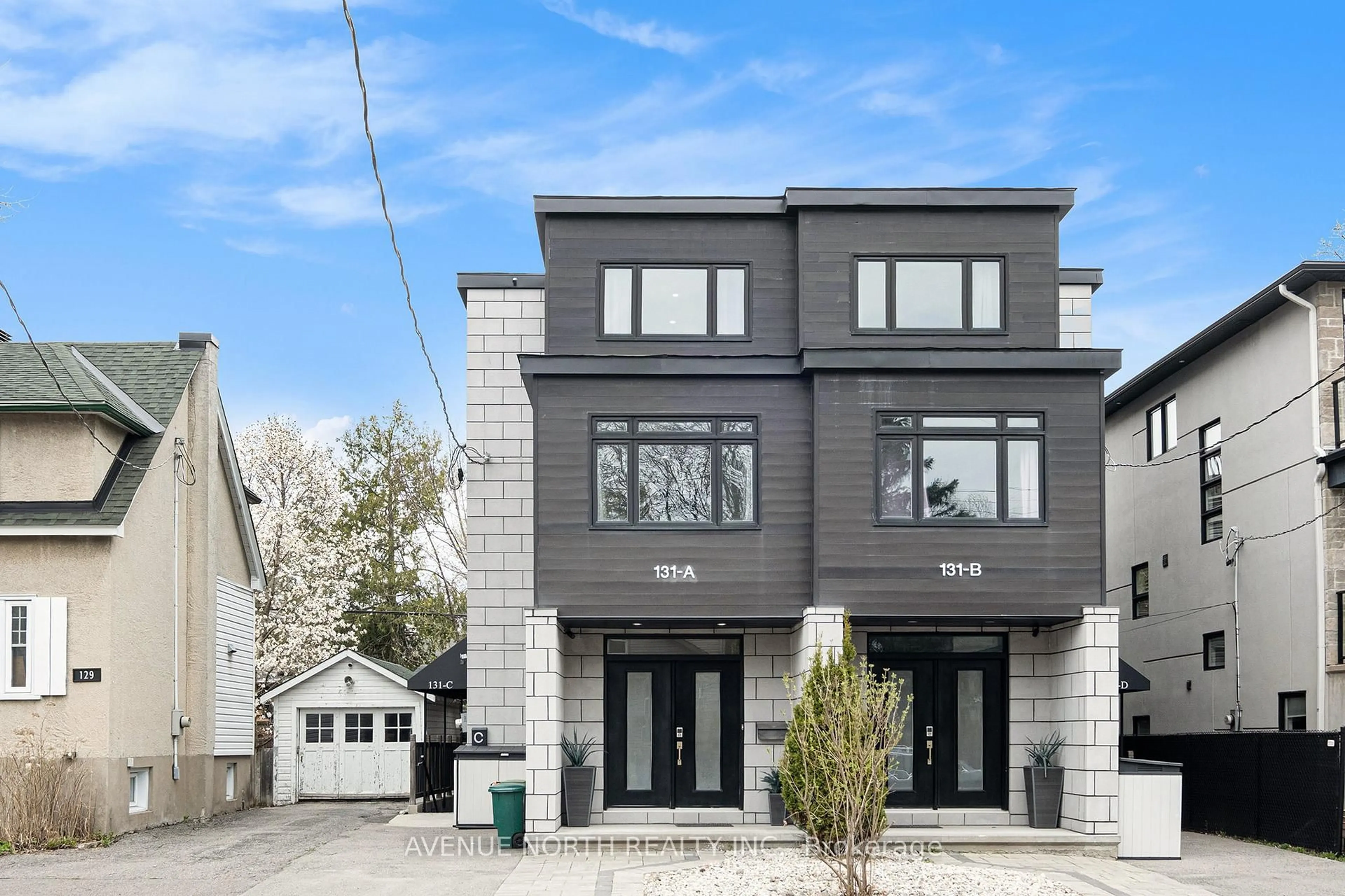 Home with brick exterior material, street for 131A Queen Mary St, Ottawa Ontario K1K 1X4