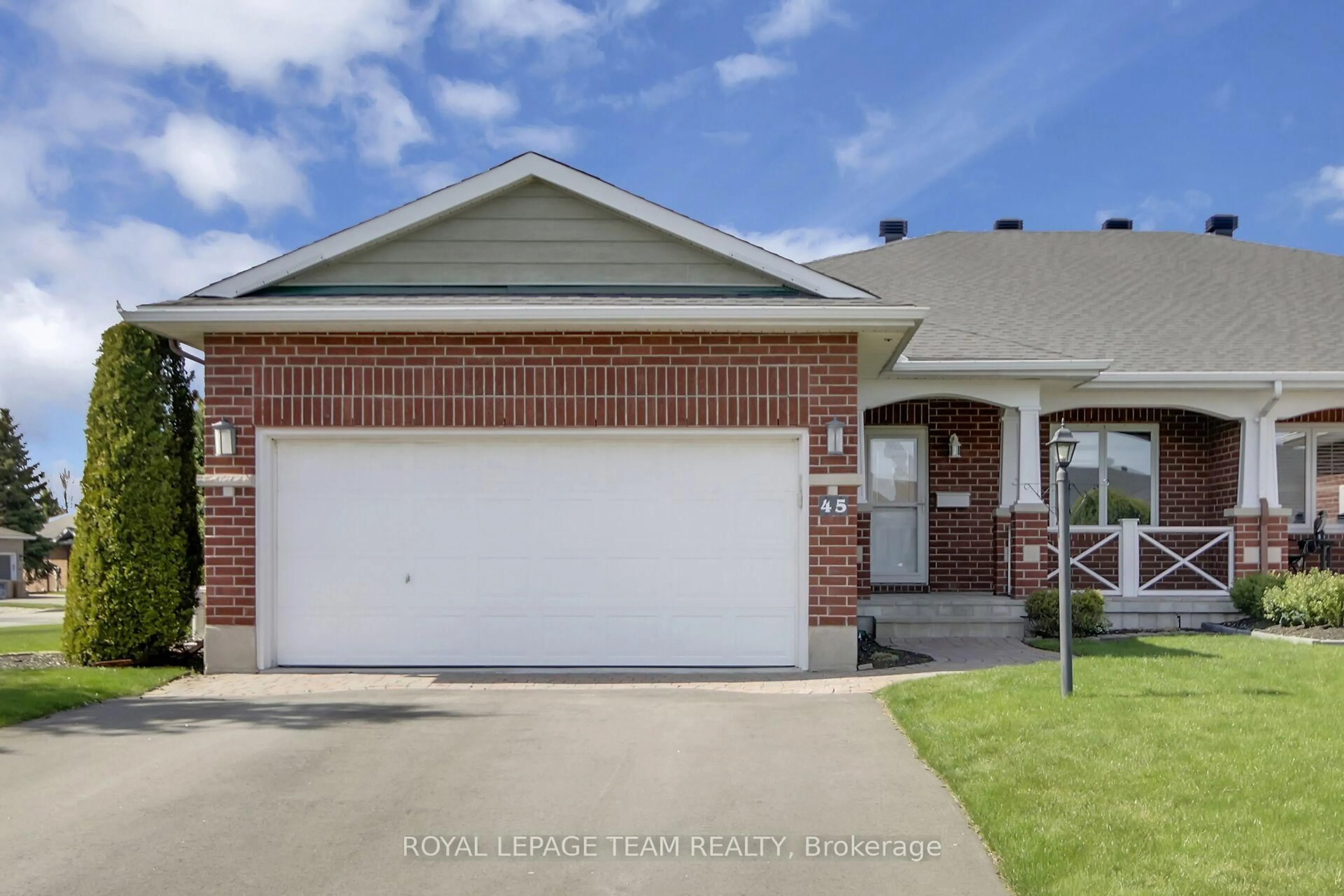 Home with brick exterior material, street for 45 Amberlakes Dr, Ottawa Ontario K2S 2A2