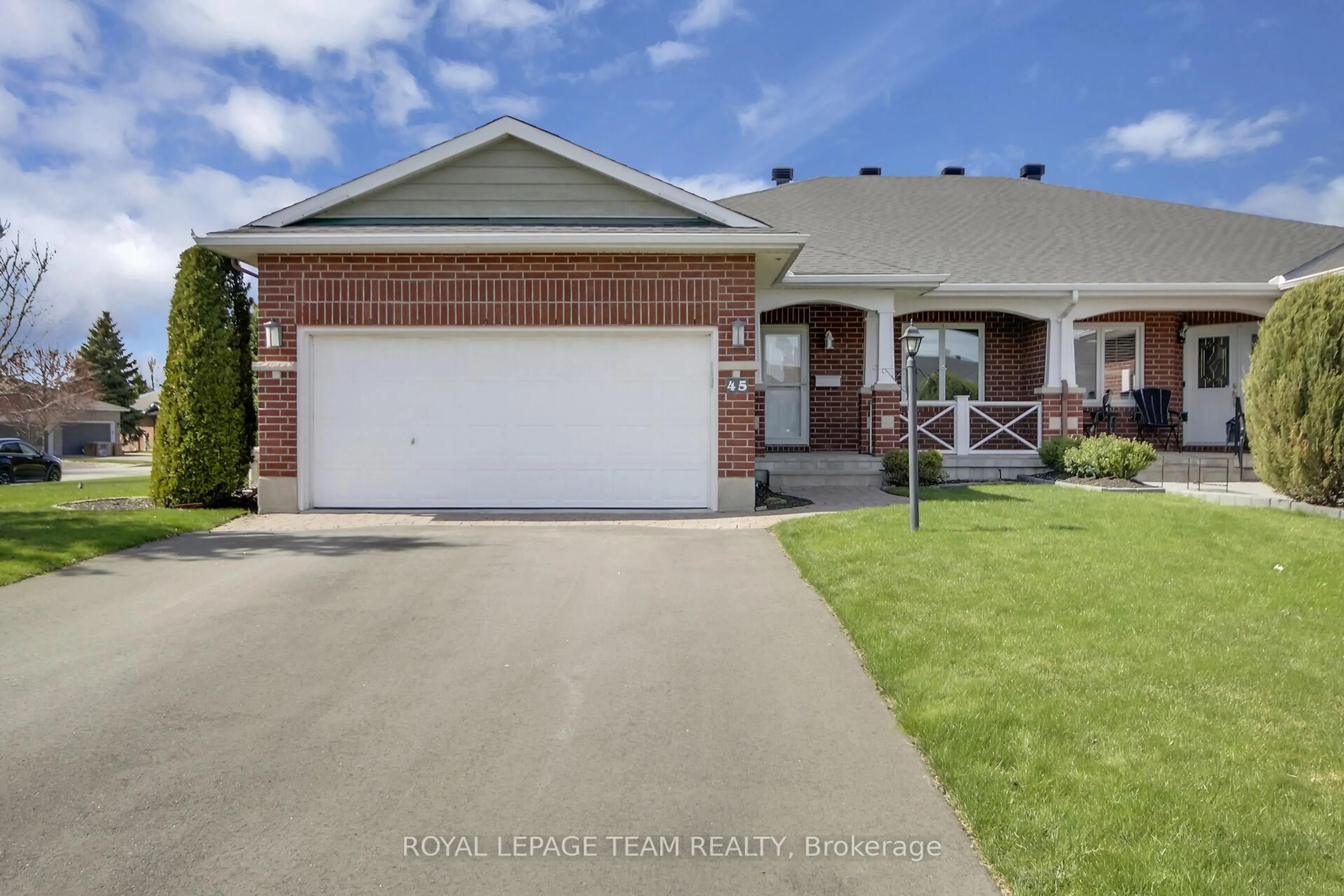 Home with brick exterior material, street for 45 Amberlakes Dr, Ottawa Ontario K2S 2A2