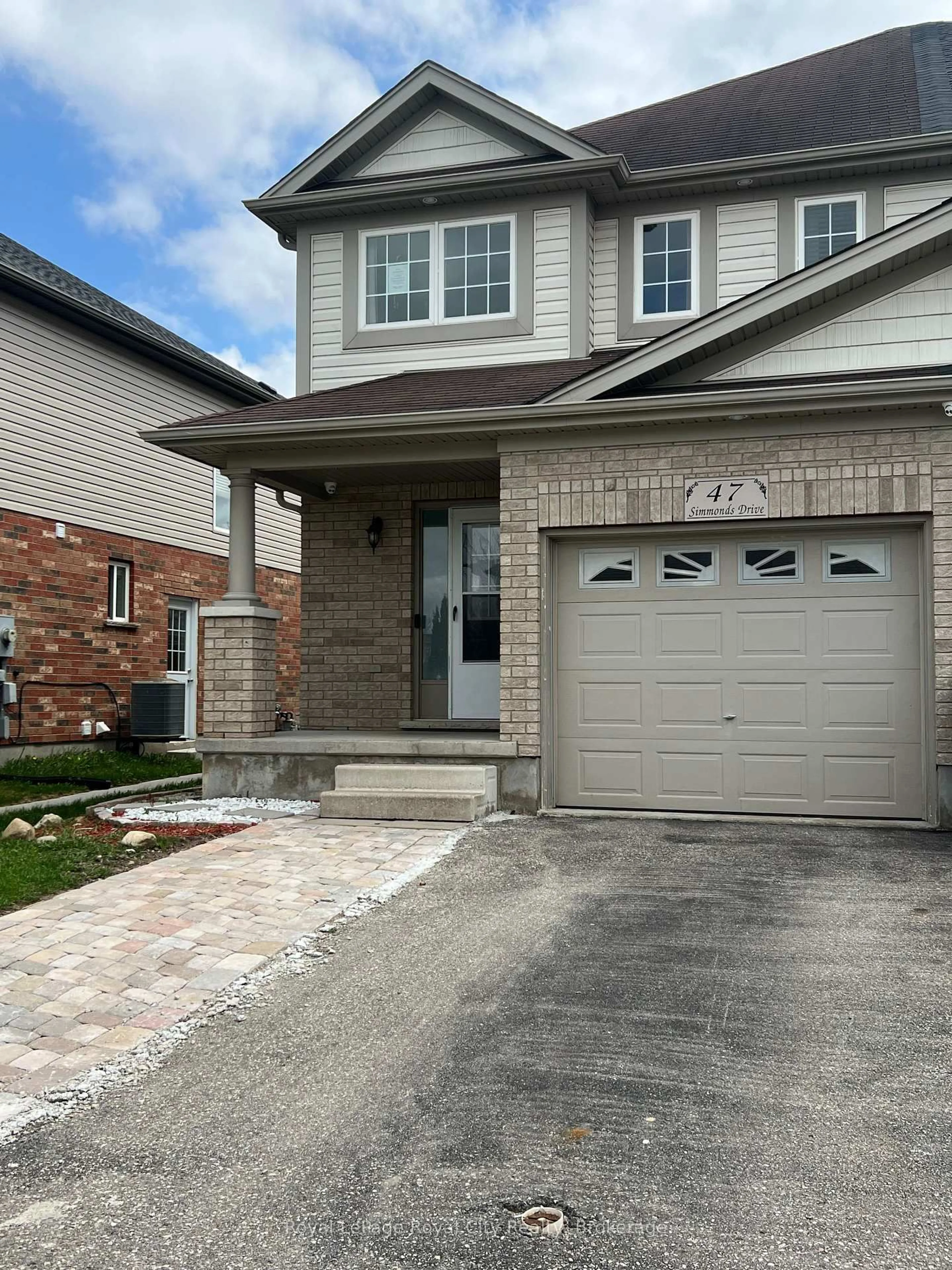 Home with brick exterior material, street for 47 Simmonds Dr, Guelph Ontario N1E 0A9