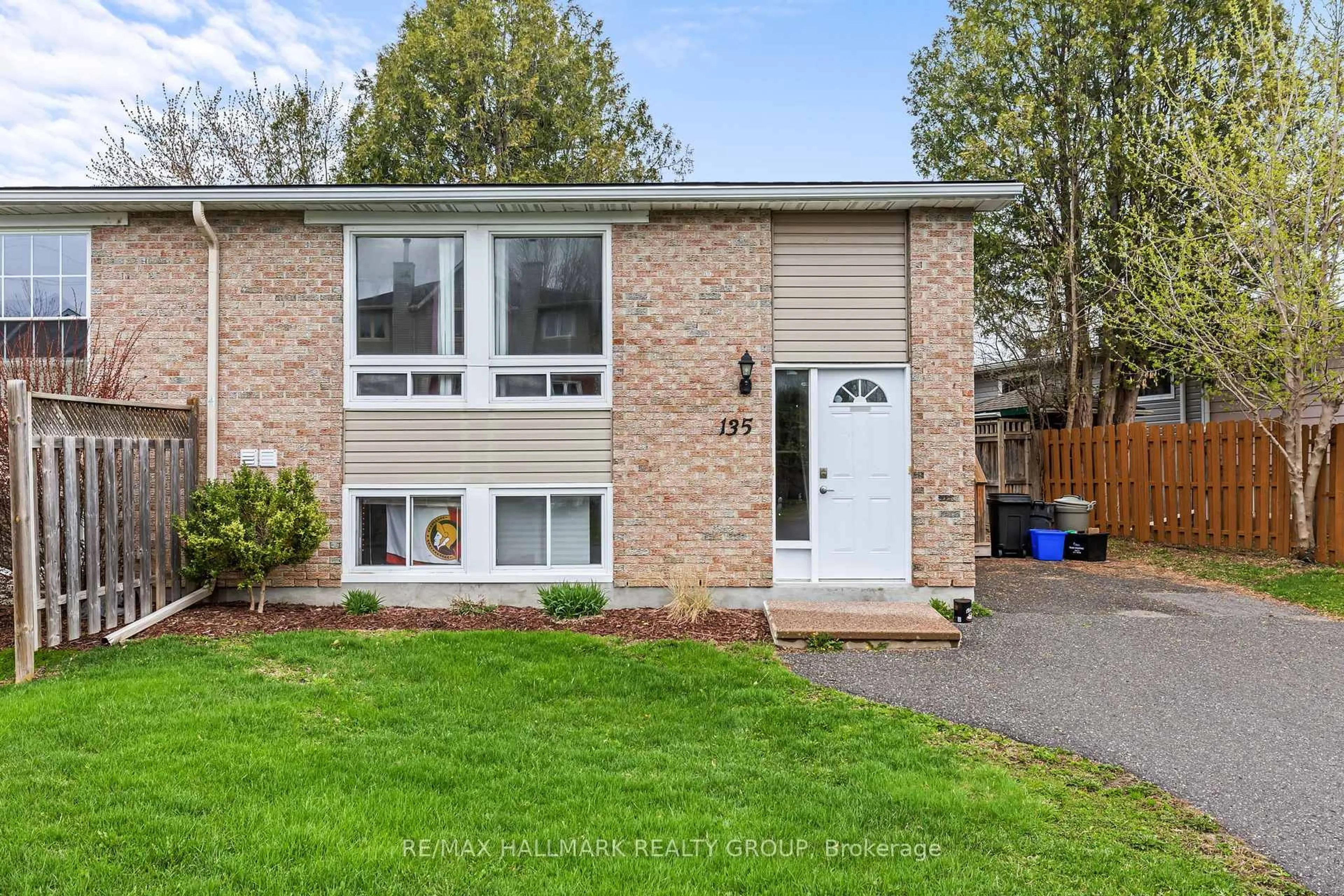 Home with brick exterior material, street for 135 Glamorgan Dr, Kanata Ontario K2L 1R7