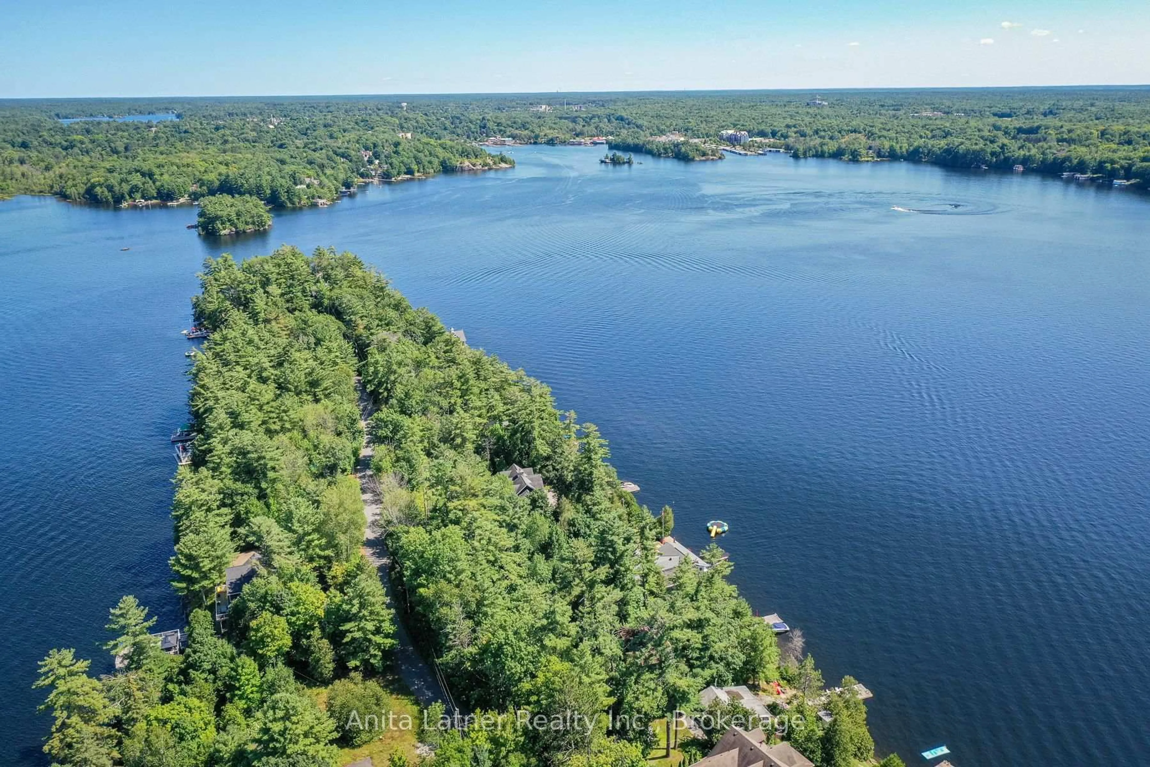 A pic from outside/outdoor area/front of a property/back of a property/a pic from drone, water/lake/river/ocean view for 1180 PARKERS POINT Rd, Gravenhurst Ontario P1P 1R2