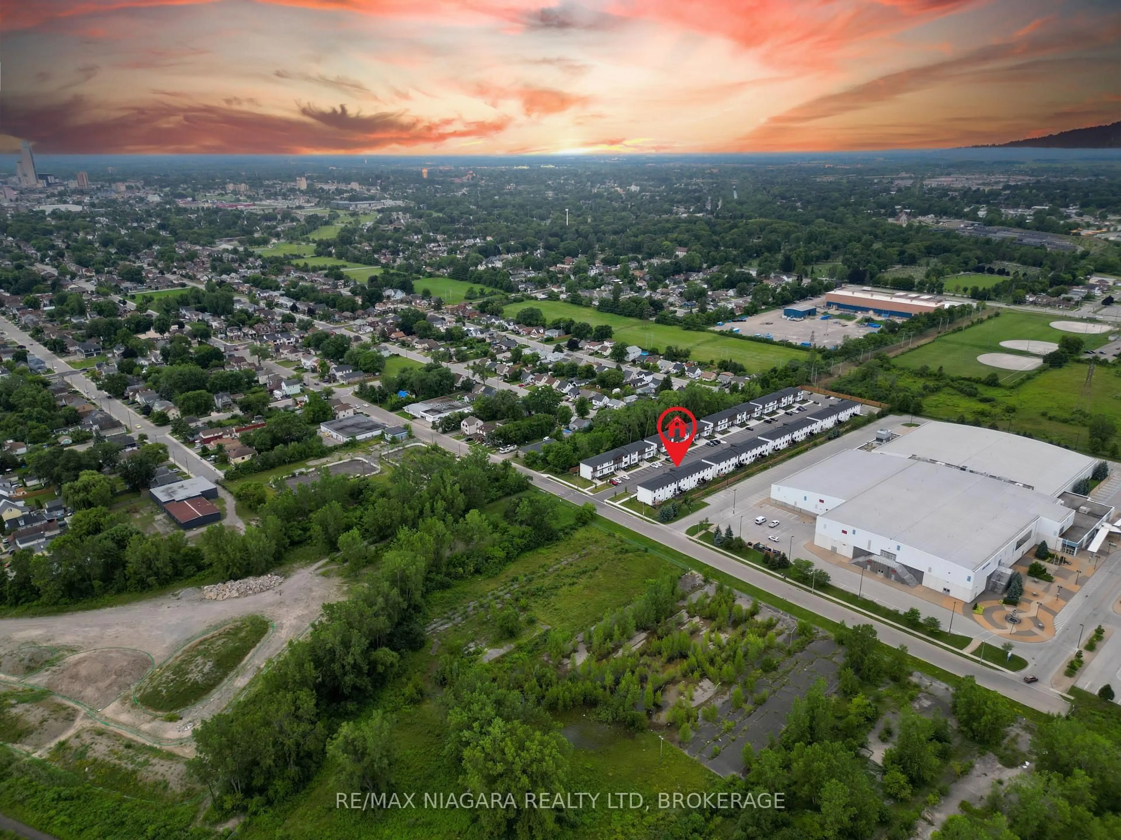 A pic from outside/outdoor area/front of a property/back of a property/a pic from drone, mountain view for 4263 Fourth Ave #211, Niagara Falls Ontario L2E 0C2