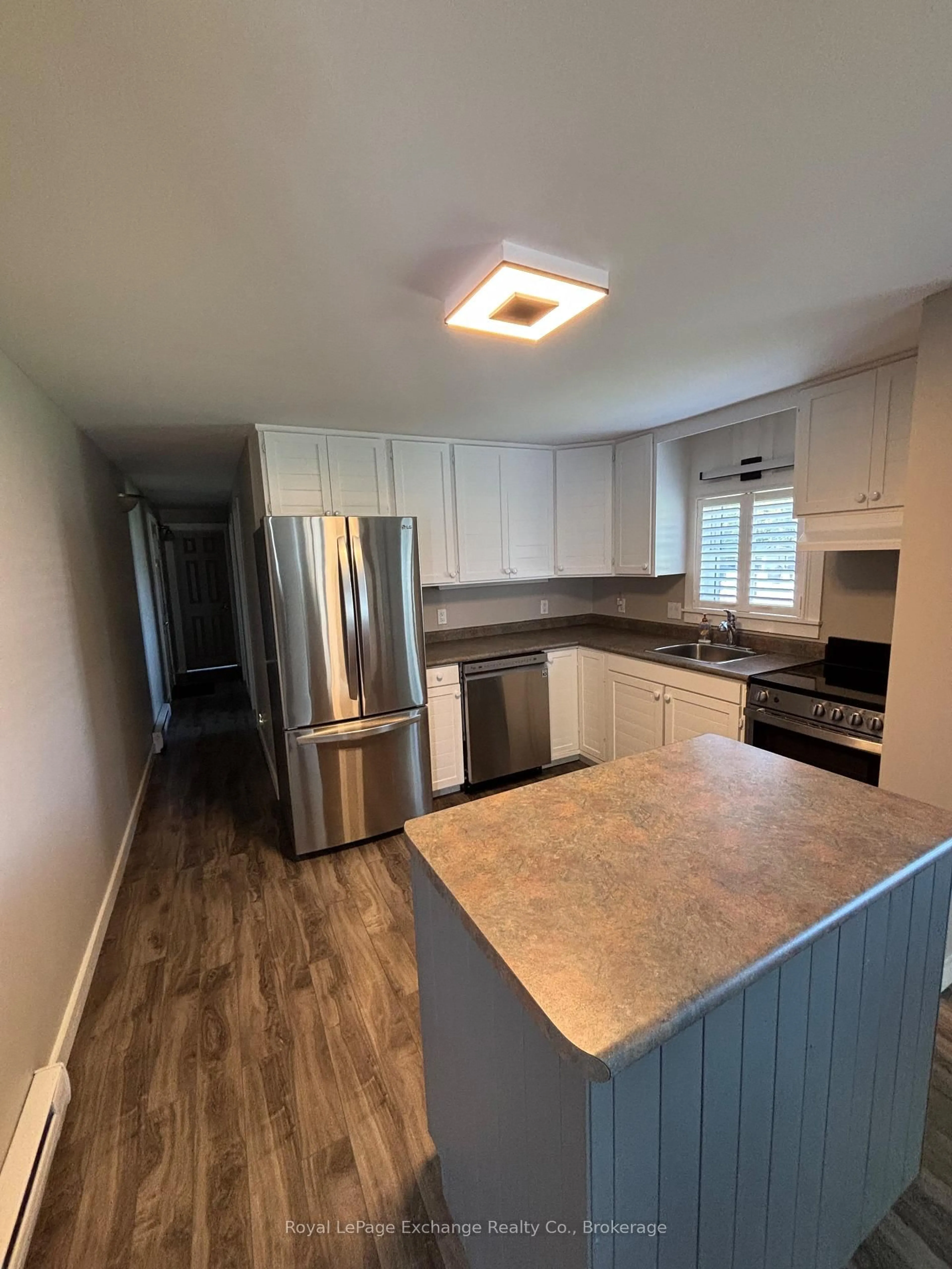 Open concept kitchen, wood/laminate floor for 66 Applewood Blvd, Kincardine Ontario N0G 2T0