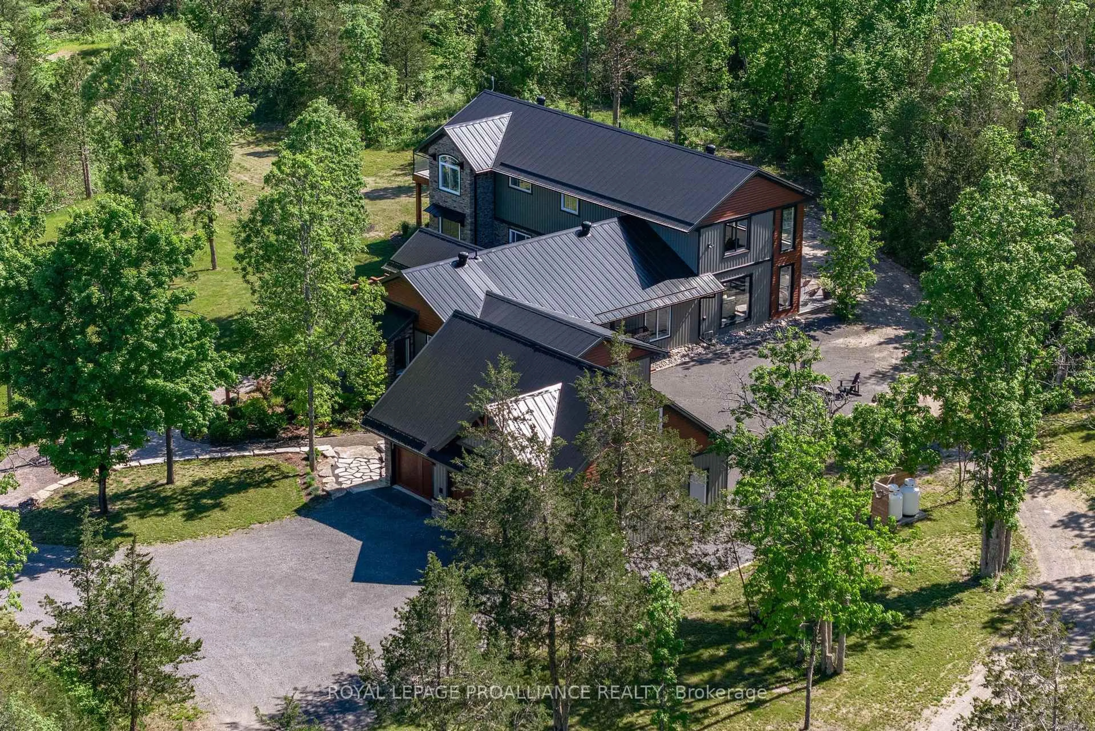 A pic from outside/outdoor area/front of a property/back of a property/a pic from drone, mountain view for 1889 MELROSE Rd, Shannonville Ontario K0K 2N0