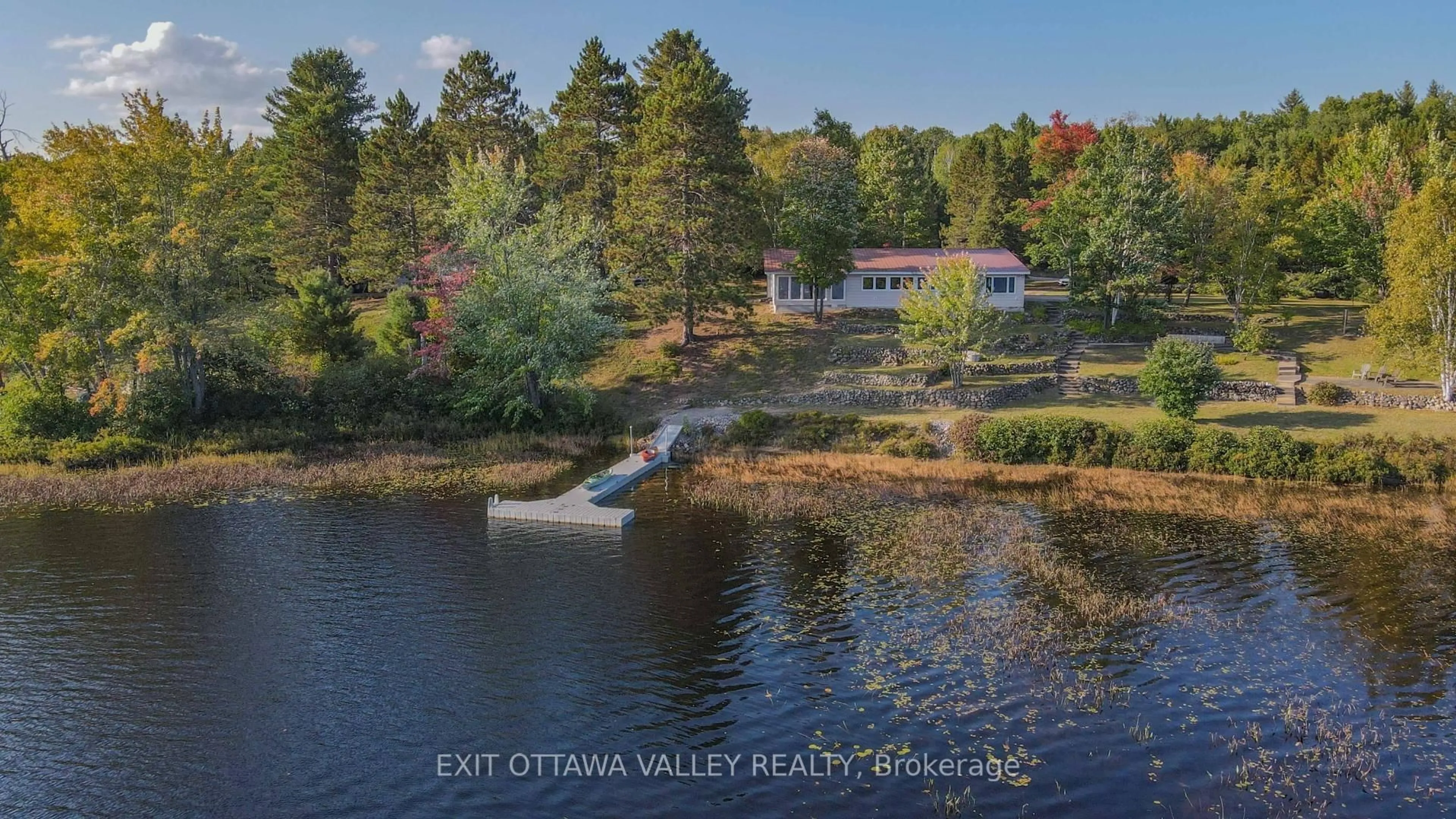 A pic from outside/outdoor area/front of a property/back of a property/a pic from drone, water/lake/river/ocean view for 885 Gunns Rd, Round Lake Centre Ontario K0J 2J0