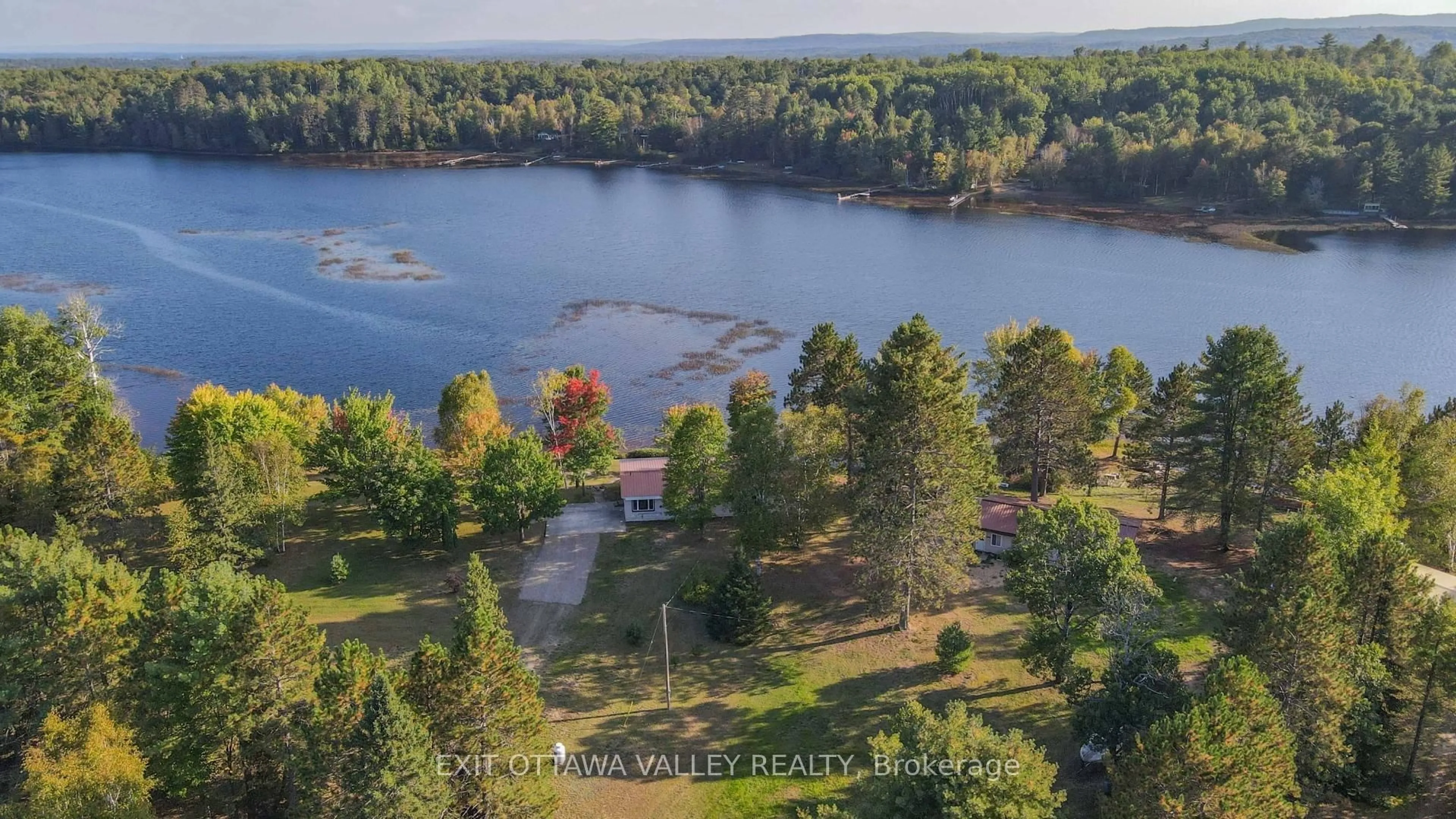 A pic from outside/outdoor area/front of a property/back of a property/a pic from drone, water/lake/river/ocean view for 885 Gunns Rd, Round Lake Centre Ontario K0J 2J0