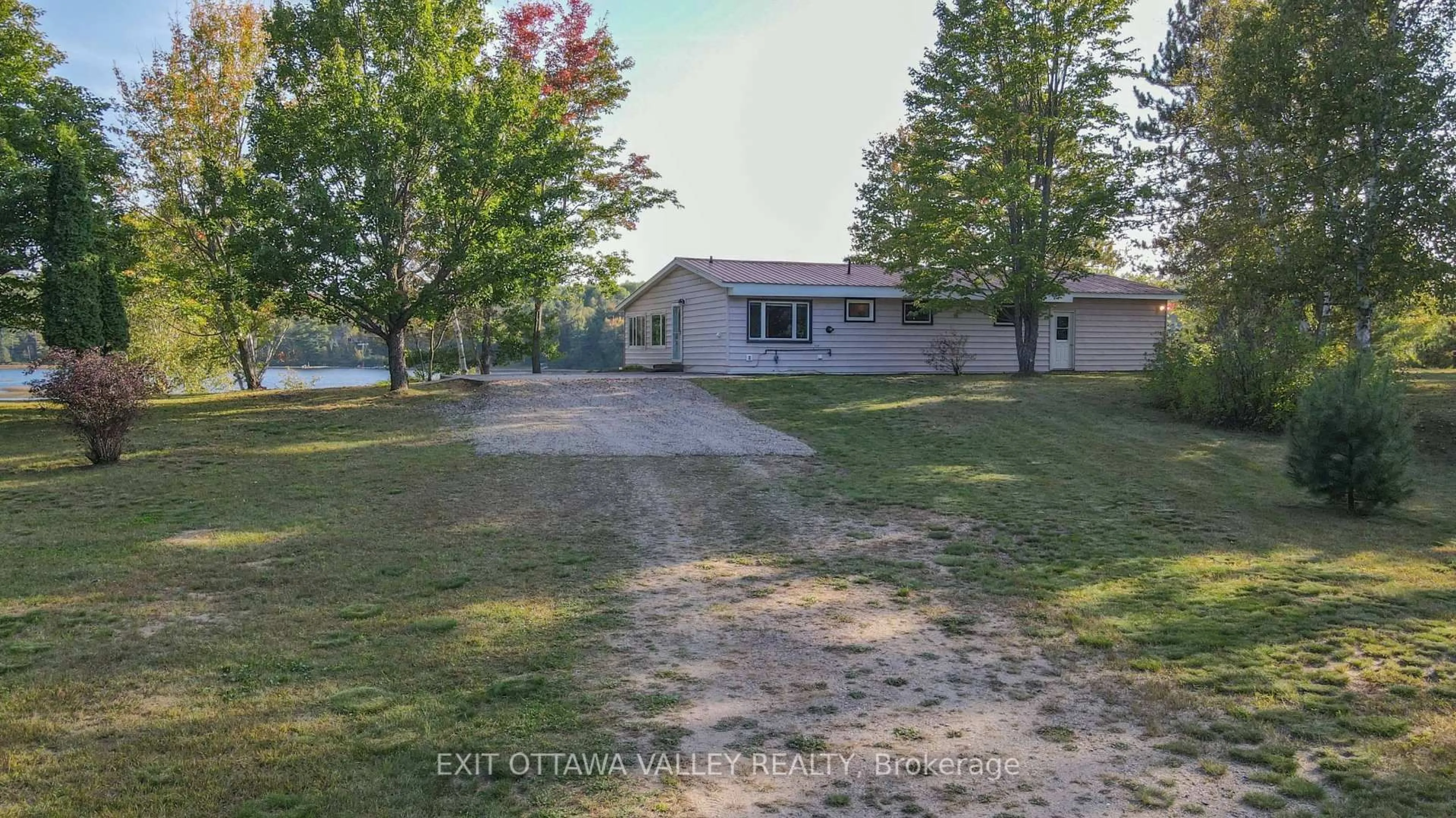 A pic from outside/outdoor area/front of a property/back of a property/a pic from drone, street for 885 Gunns Rd, Round Lake Centre Ontario K0J 2J0