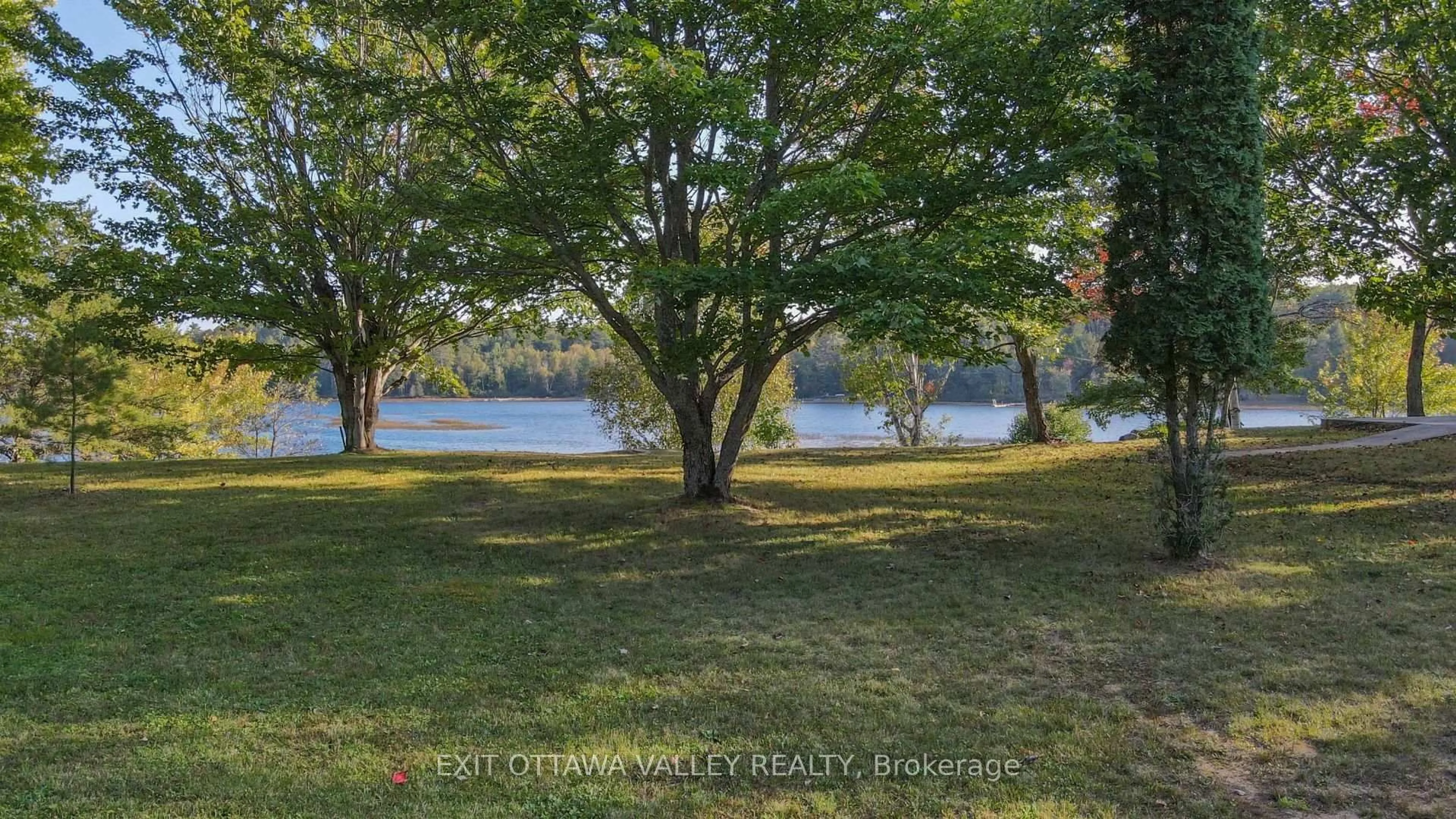 A pic from outside/outdoor area/front of a property/back of a property/a pic from drone, water/lake/river/ocean view for 885 Gunns Rd, Round Lake Centre Ontario K0J 2J0