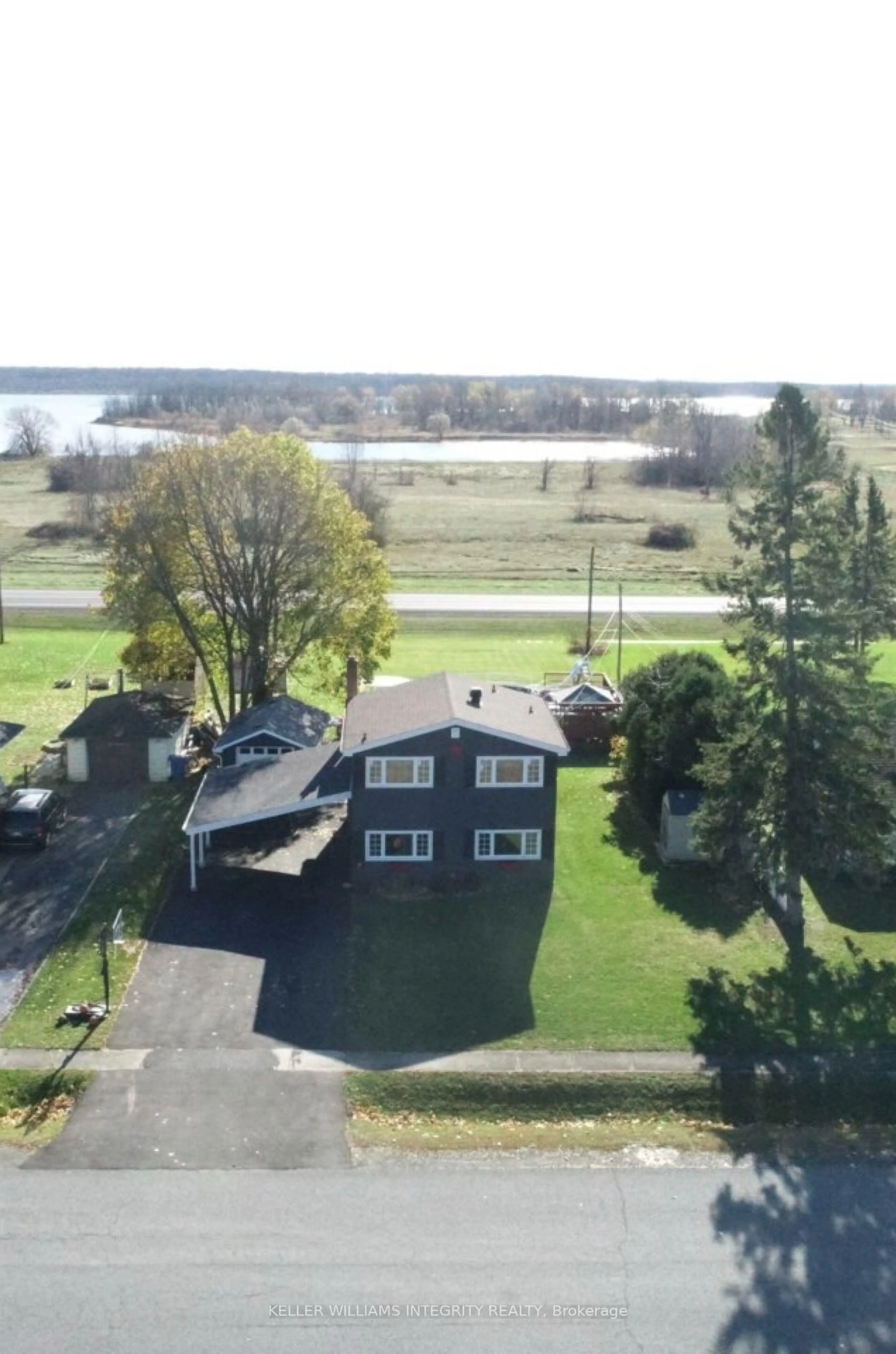 A pic from outside/outdoor area/front of a property/back of a property/a pic from drone, water/lake/river/ocean view for 38 St Lawrence St, South Stormont Ontario K0C 1M0