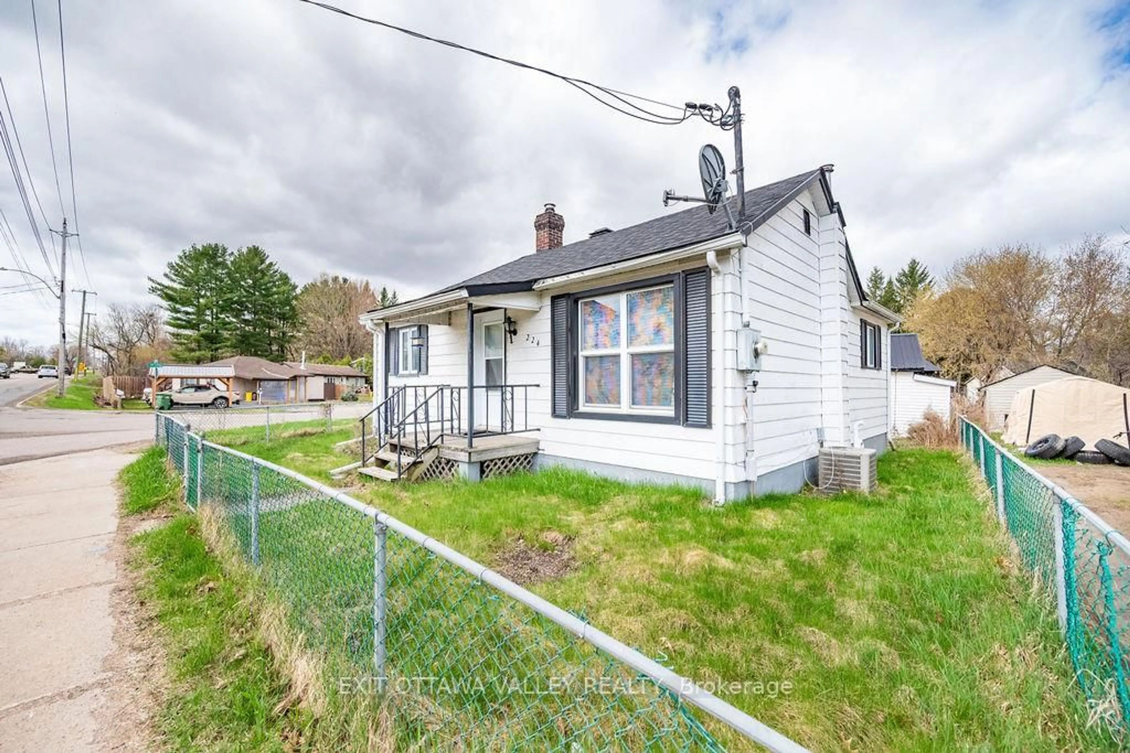 Home with vinyl exterior material, street for 224 Forced Rd, Pembroke Ontario K8A 5J4