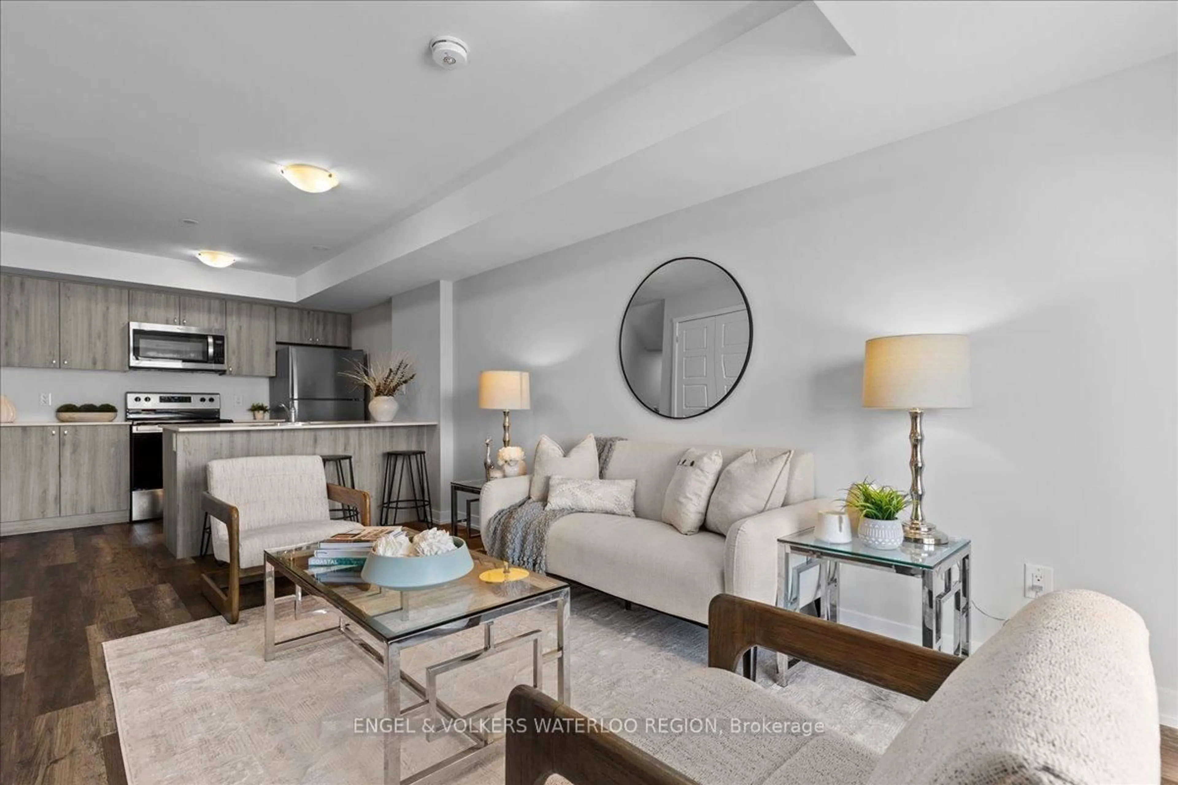 Living room with furniture, unknown for 1331 Countrystone Dr #A4, Kitchener Ontario N2N 0C5