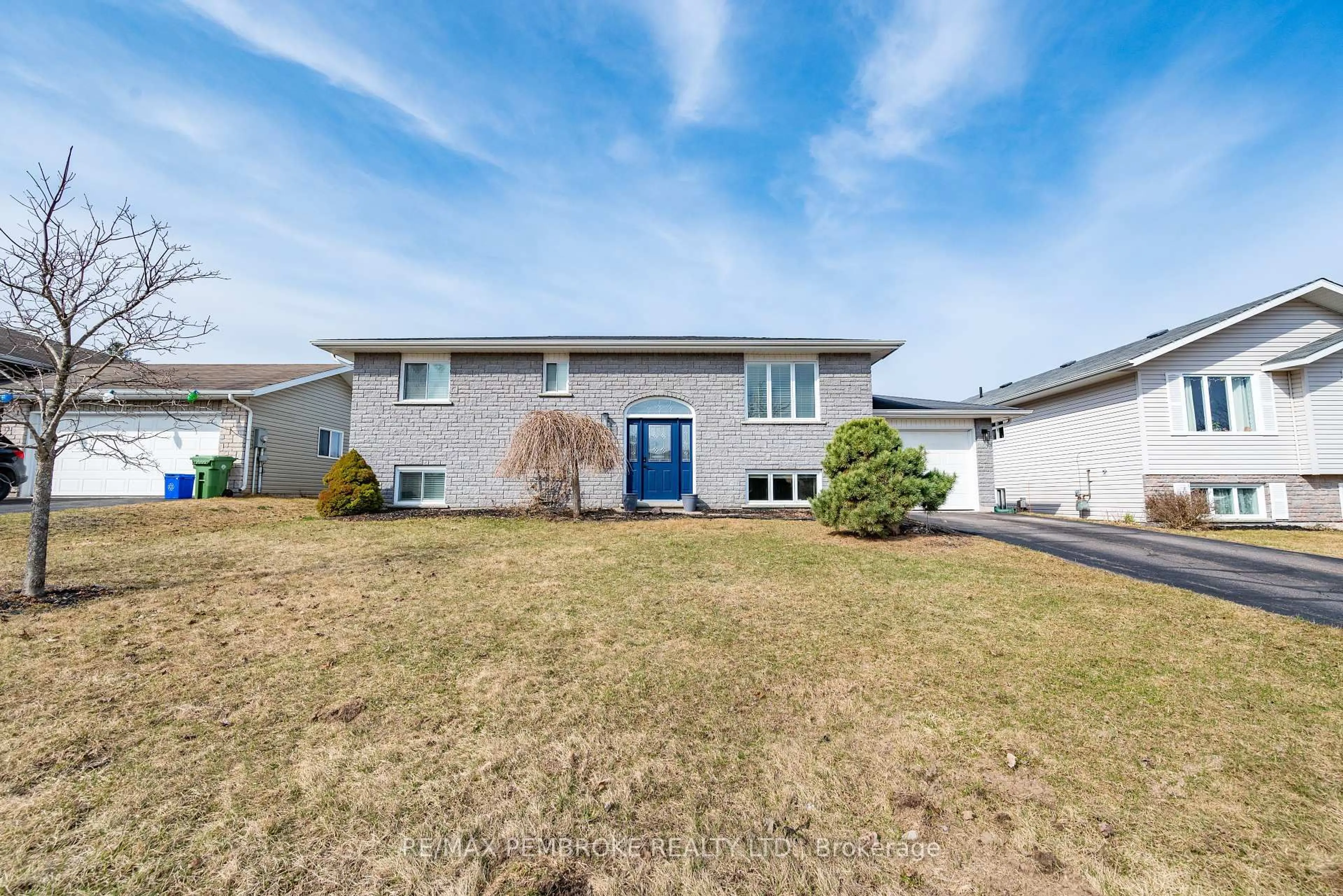 Home with vinyl exterior material, street for 57 Spruce St, Petawawa Ontario K8H 3N6
