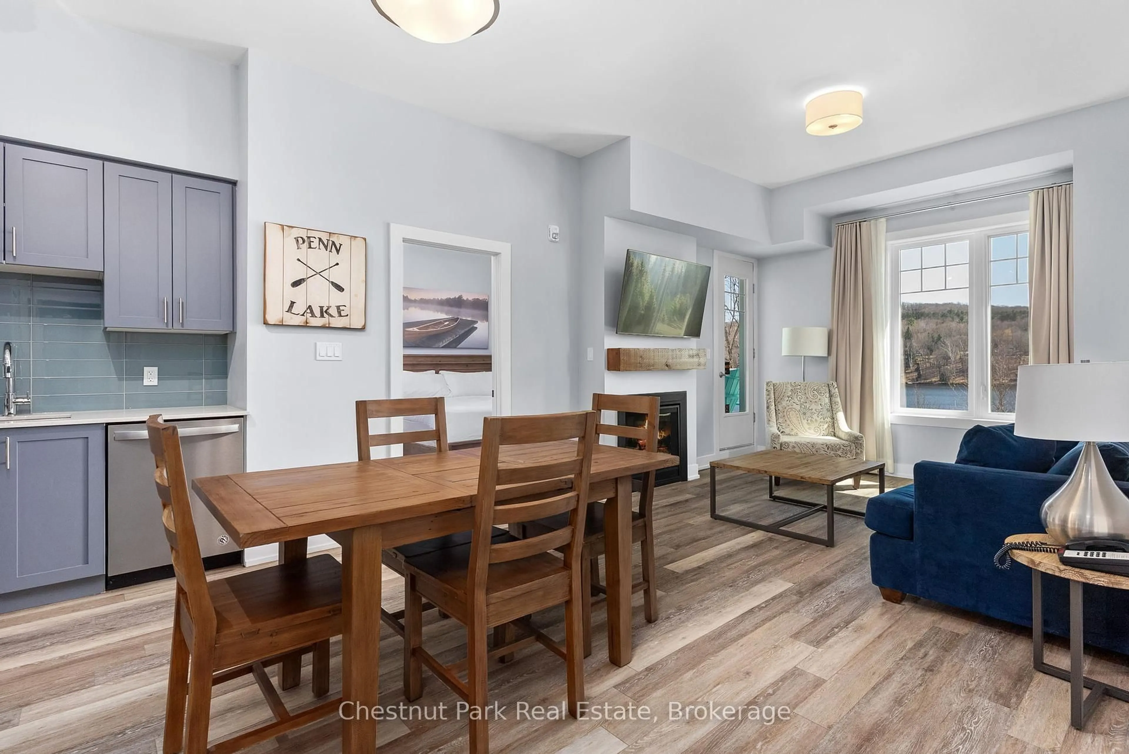 Dining room, wood/laminate floor for 25 Pen Lake Point Rd #117, Huntsville Ontario P1H 1A9