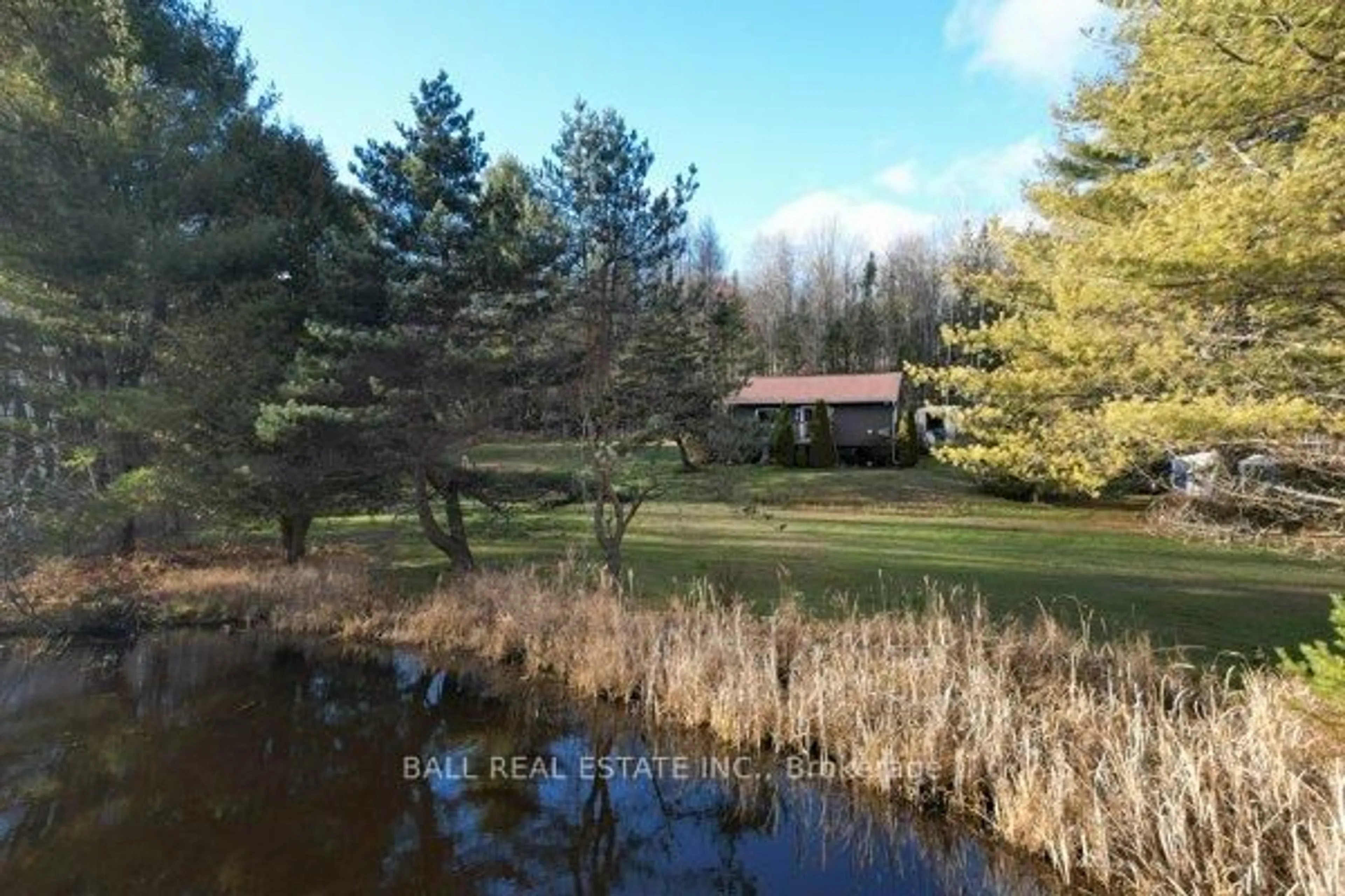 A pic from outside/outdoor area/front of a property/back of a property/a pic from drone, water/lake/river/ocean view for 1047 Donroy Rd, Highlands East Ontario K0M 1R0