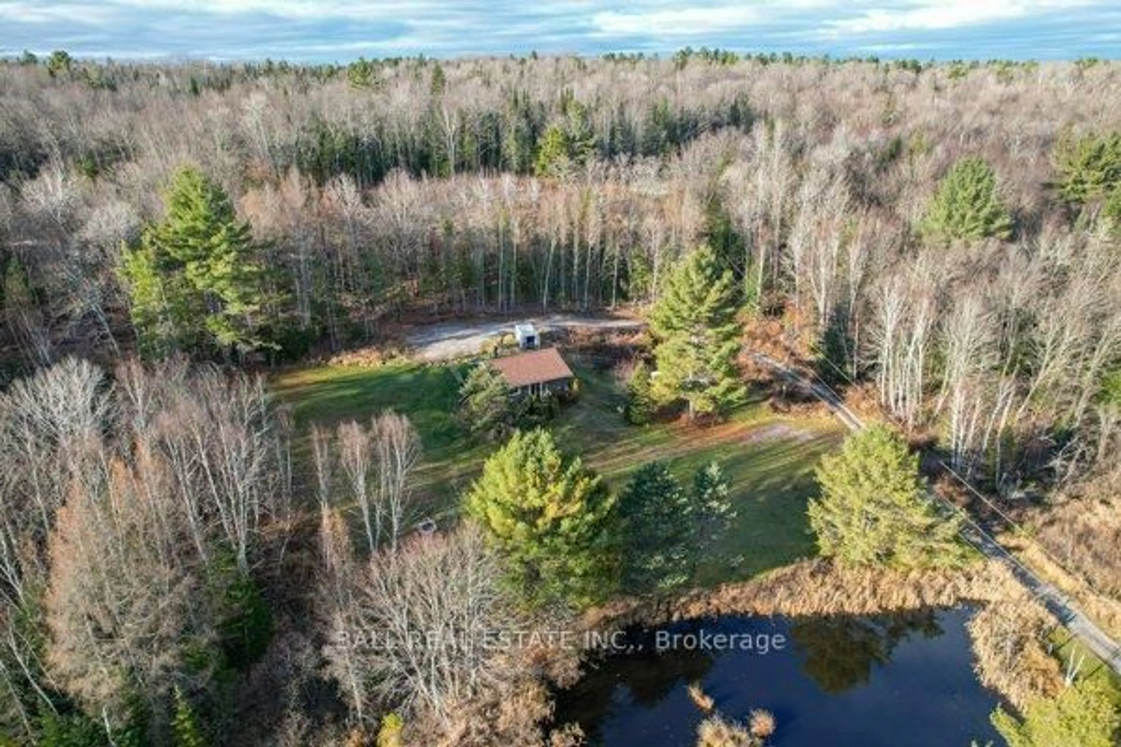 A pic from outside/outdoor area/front of a property/back of a property/a pic from drone, water/lake/river/ocean view for 1047 Donroy Rd, Highlands East Ontario K0M 1R0