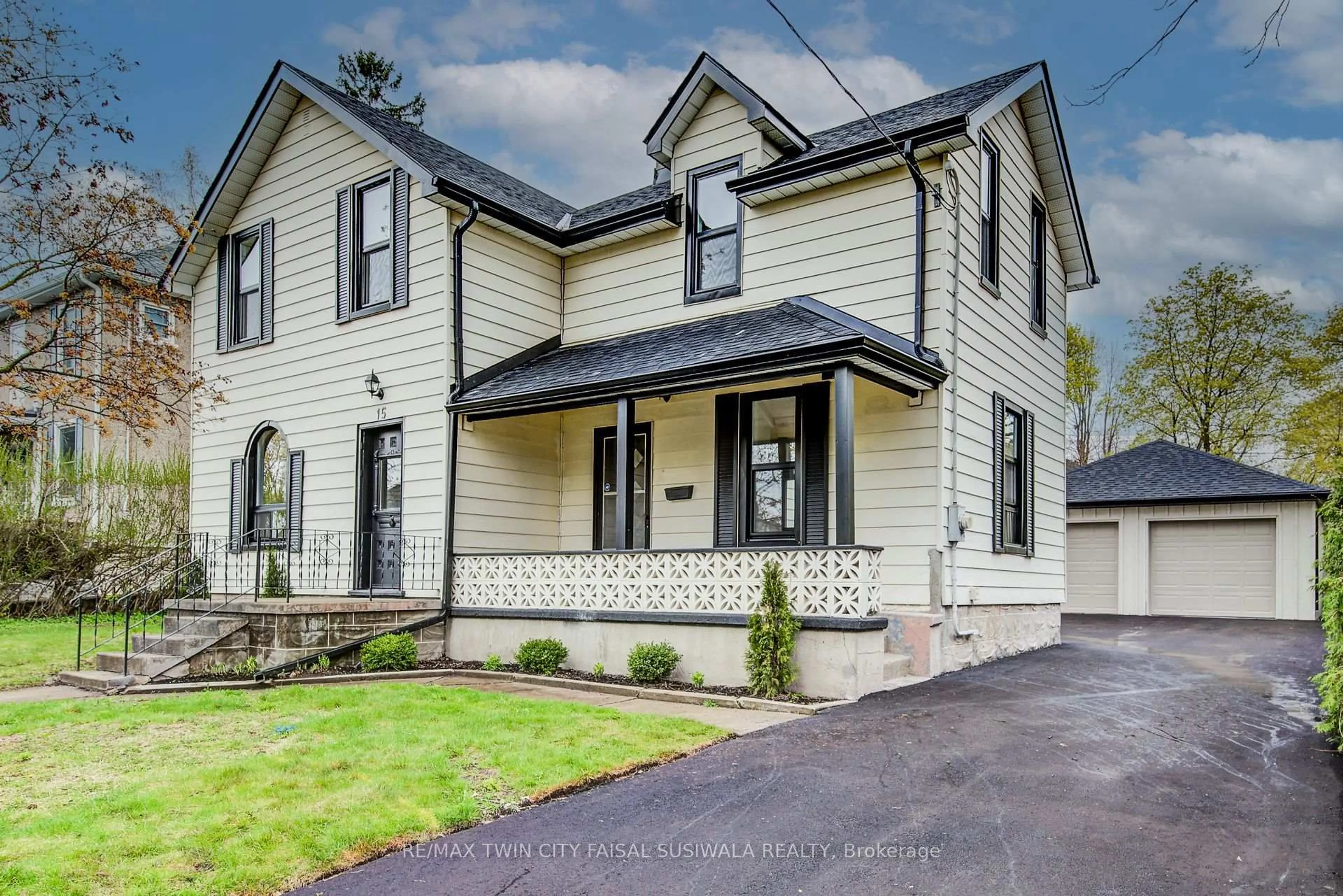 Home with vinyl exterior material, street for 15 Chisholm St, Cambridge Ontario N1R 4E3