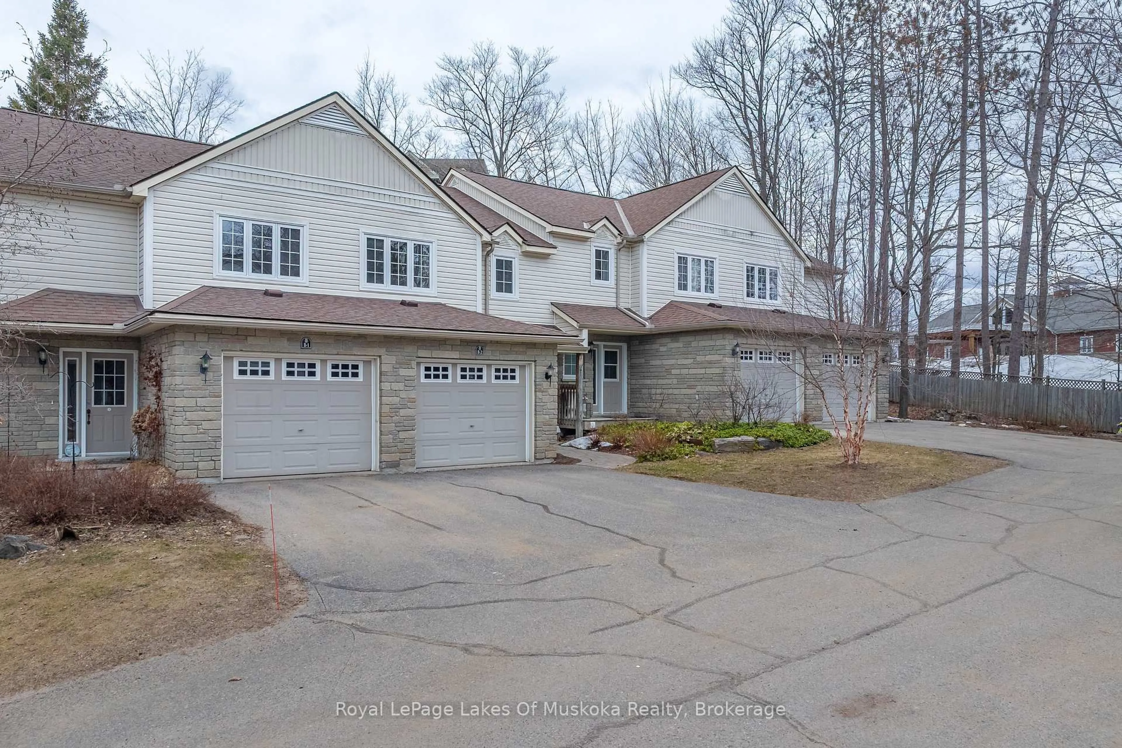 A pic from outside/outdoor area/front of a property/back of a property/a pic from drone, street for 20 Dairy Lane #B2, Huntsville Ontario P1H 2L1