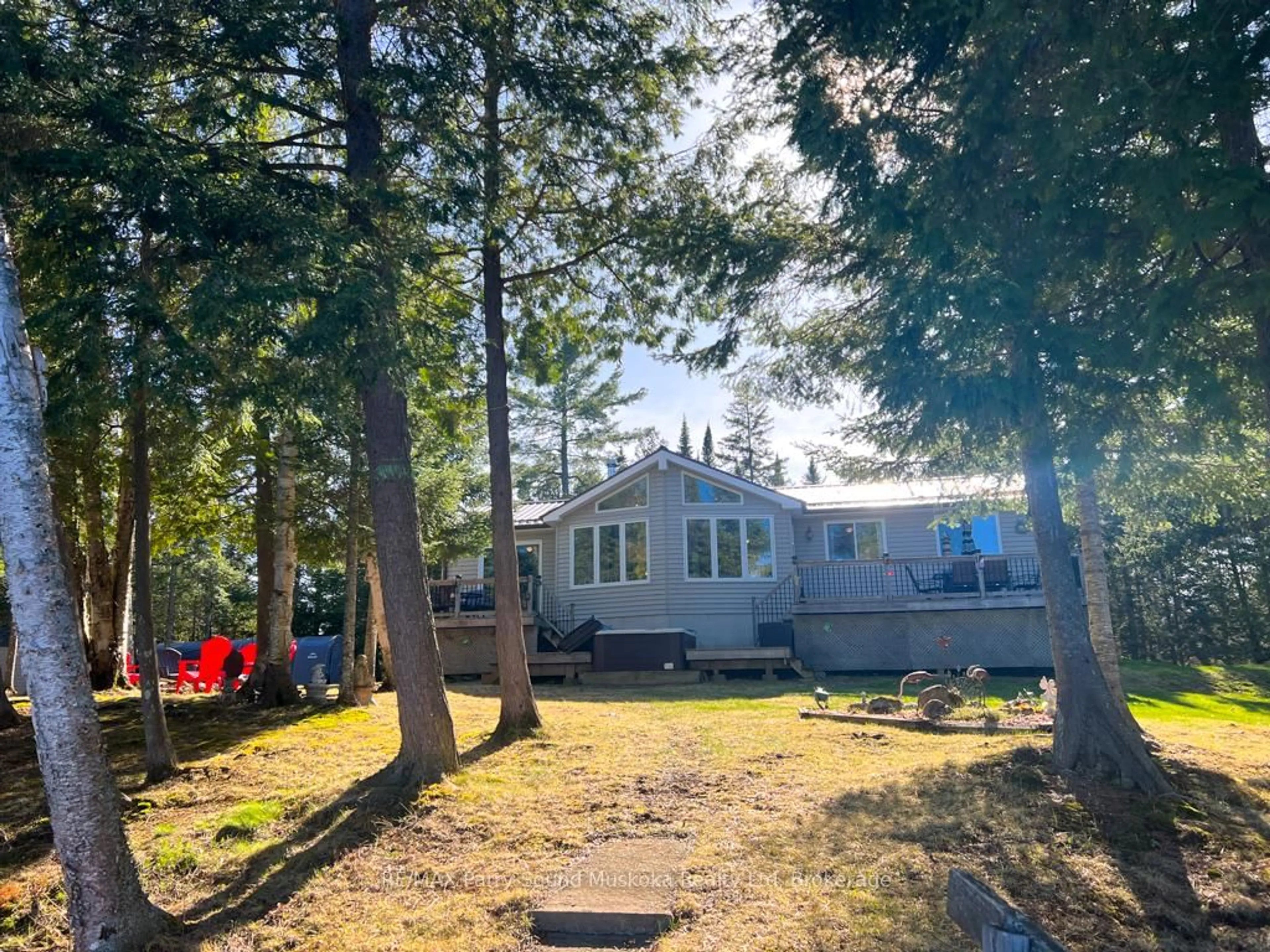 A pic from outside/outdoor area/front of a property/back of a property/a pic from drone, unknown for 471 North Meadowcove Rd, Whitestone Ontario P0A 1G0