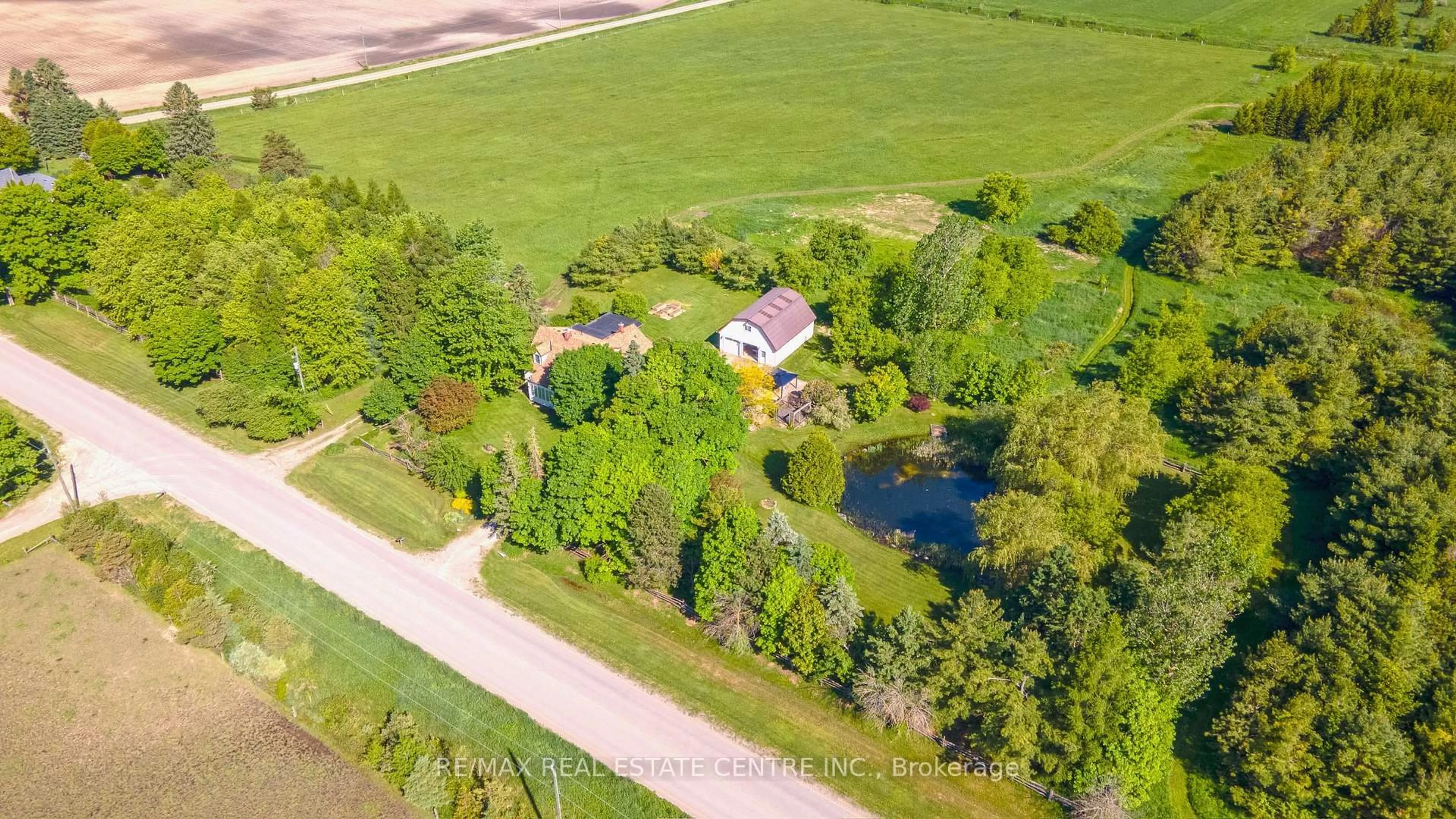 A pic from outside/outdoor area/front of a property/back of a property/a pic from drone, water/lake/river/ocean view for 384323 20 Sdrd, Amaranth Ontario L9W 3Z2