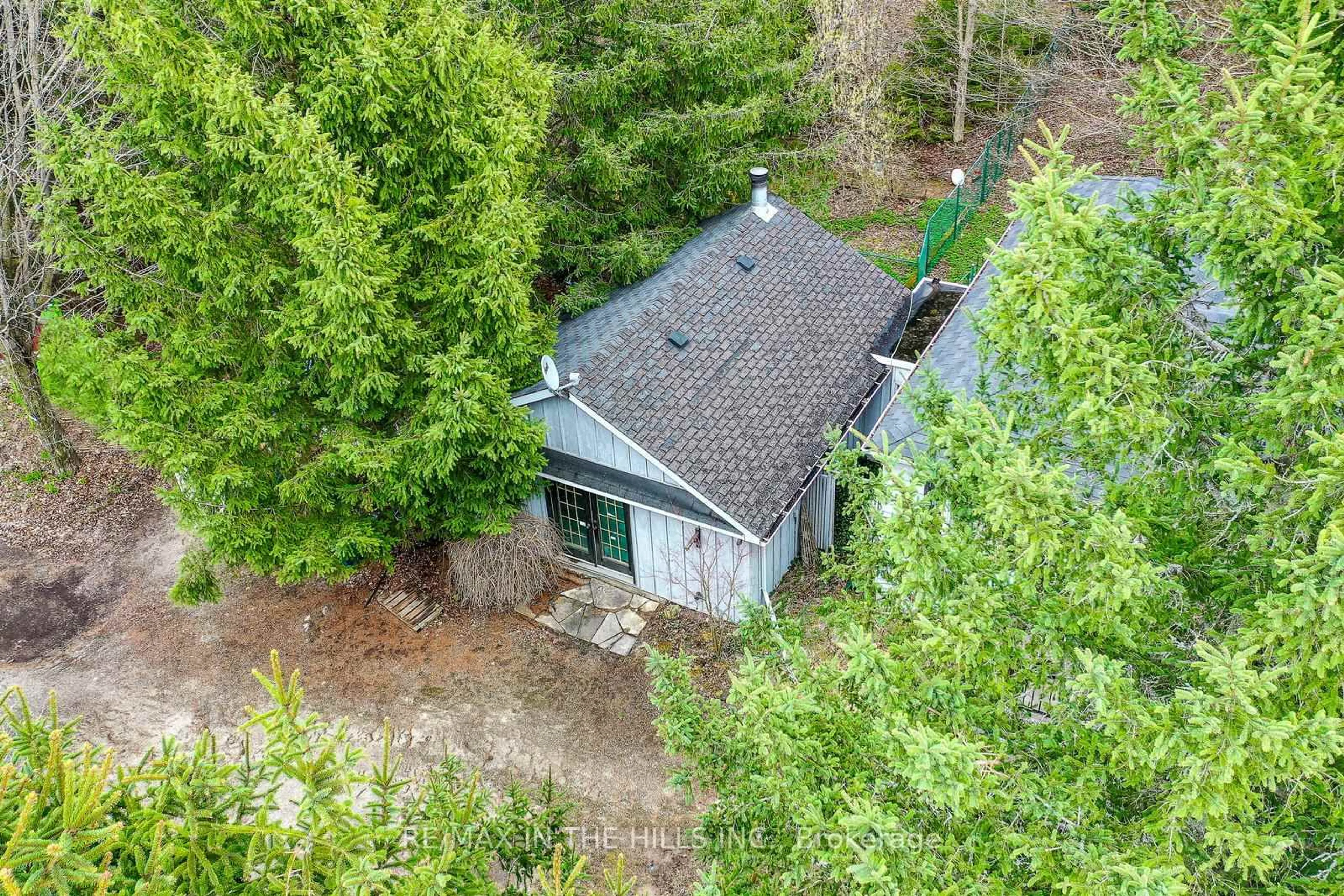 A pic from outside/outdoor area/front of a property/back of a property/a pic from drone, forest/trees view for 308304 Hockley Rd, Mono Ontario L9W 6N4