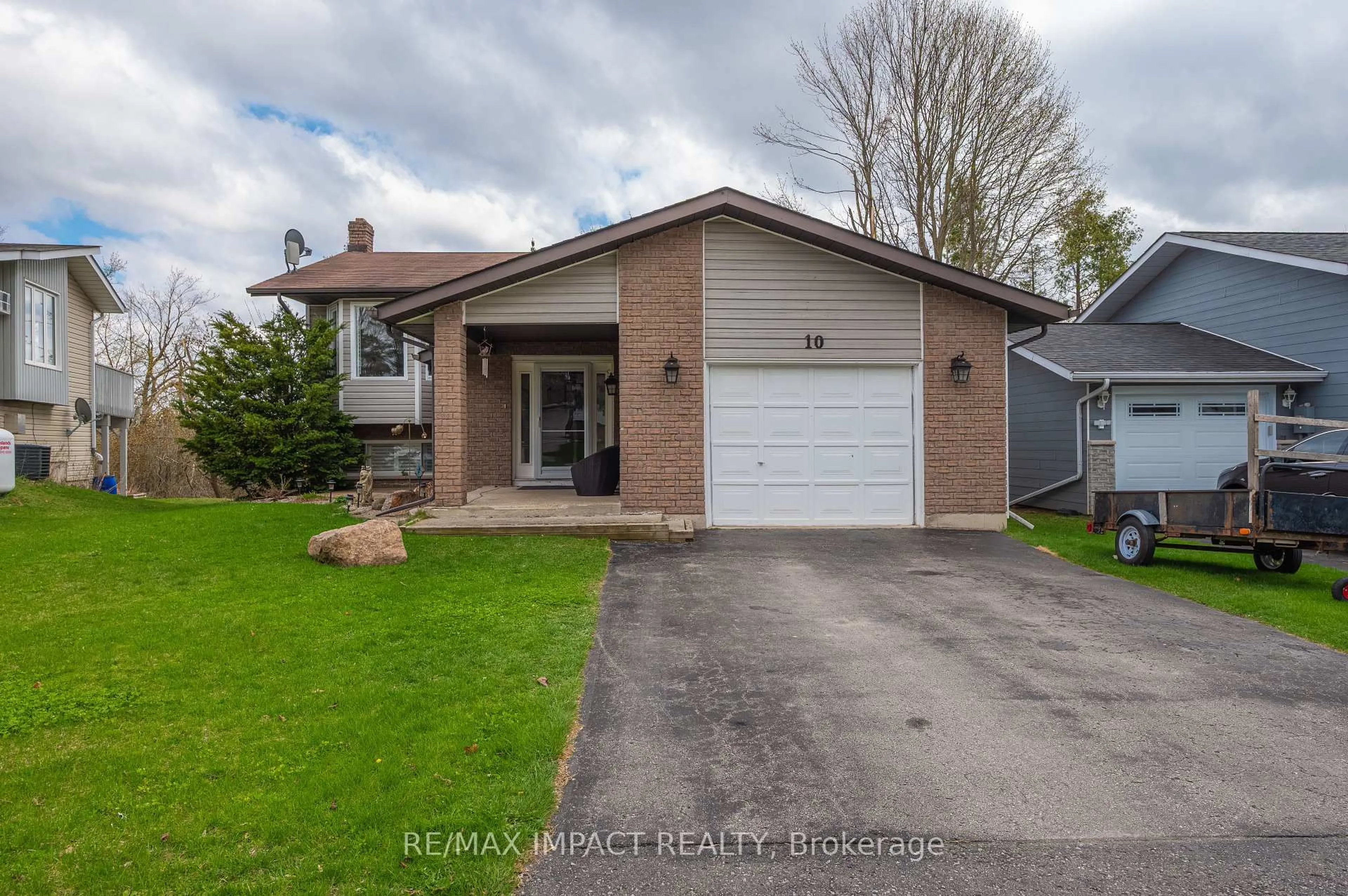 Home with brick exterior material, street for 10 Cedartree Lane, Kawartha Lakes Ontario K0M 1A0