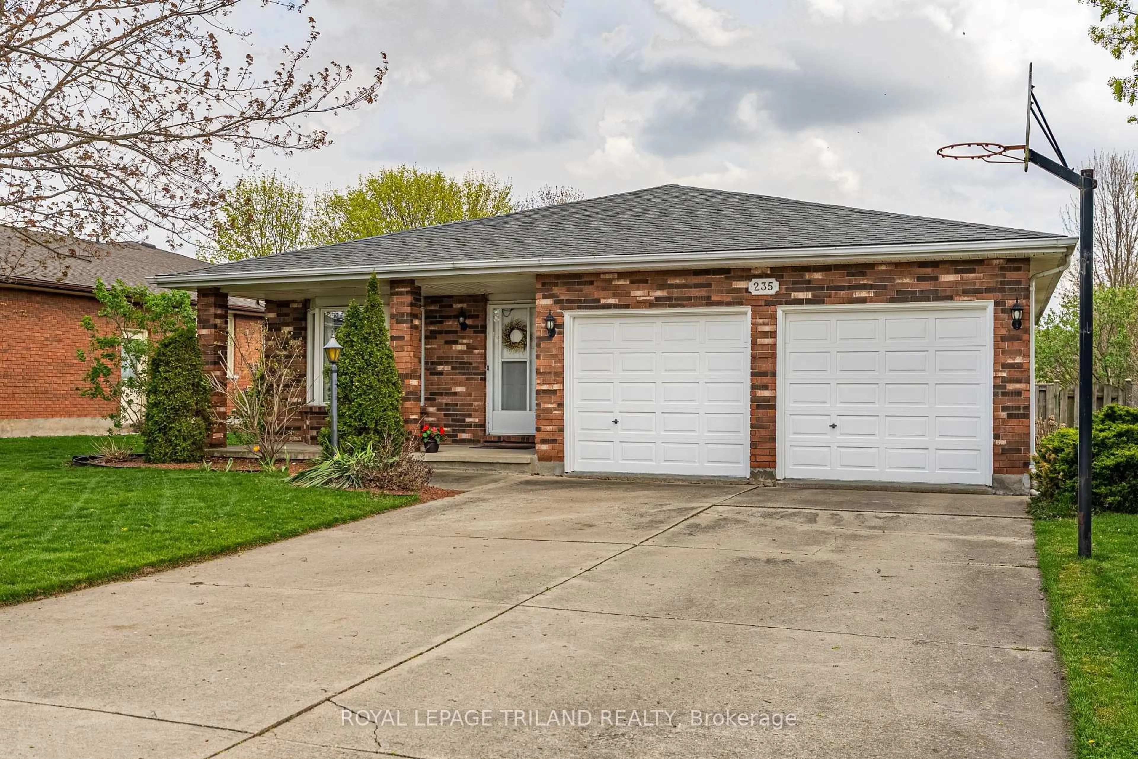 Home with brick exterior material, street for 235 Mitchell Ave, Thames Centre Ontario N0L 1G3