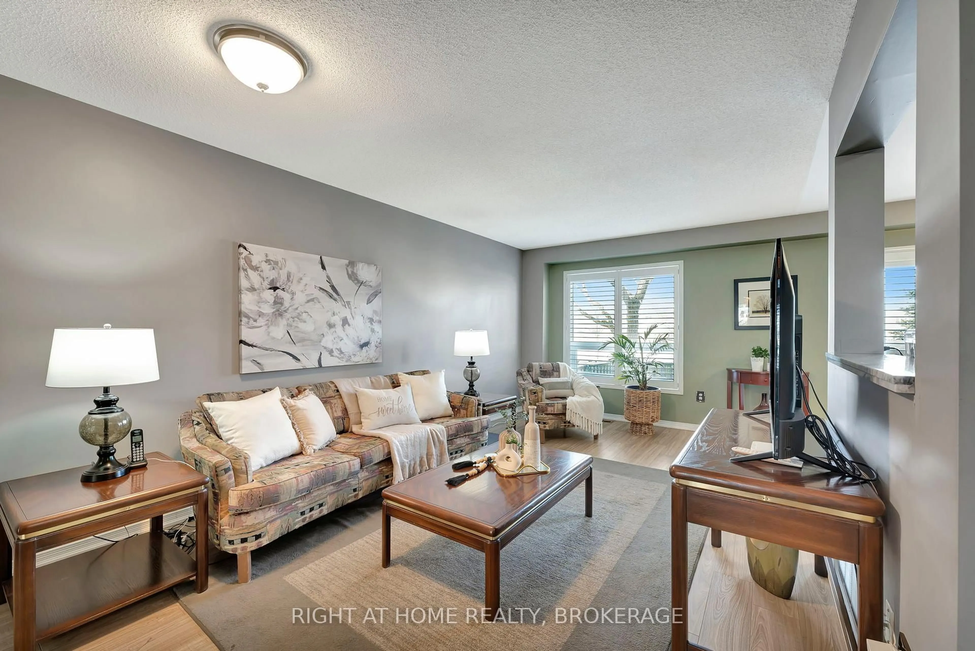 Living room with furniture, unknown for 485 Green Rd #33, Hamilton Ontario L8E 6A7