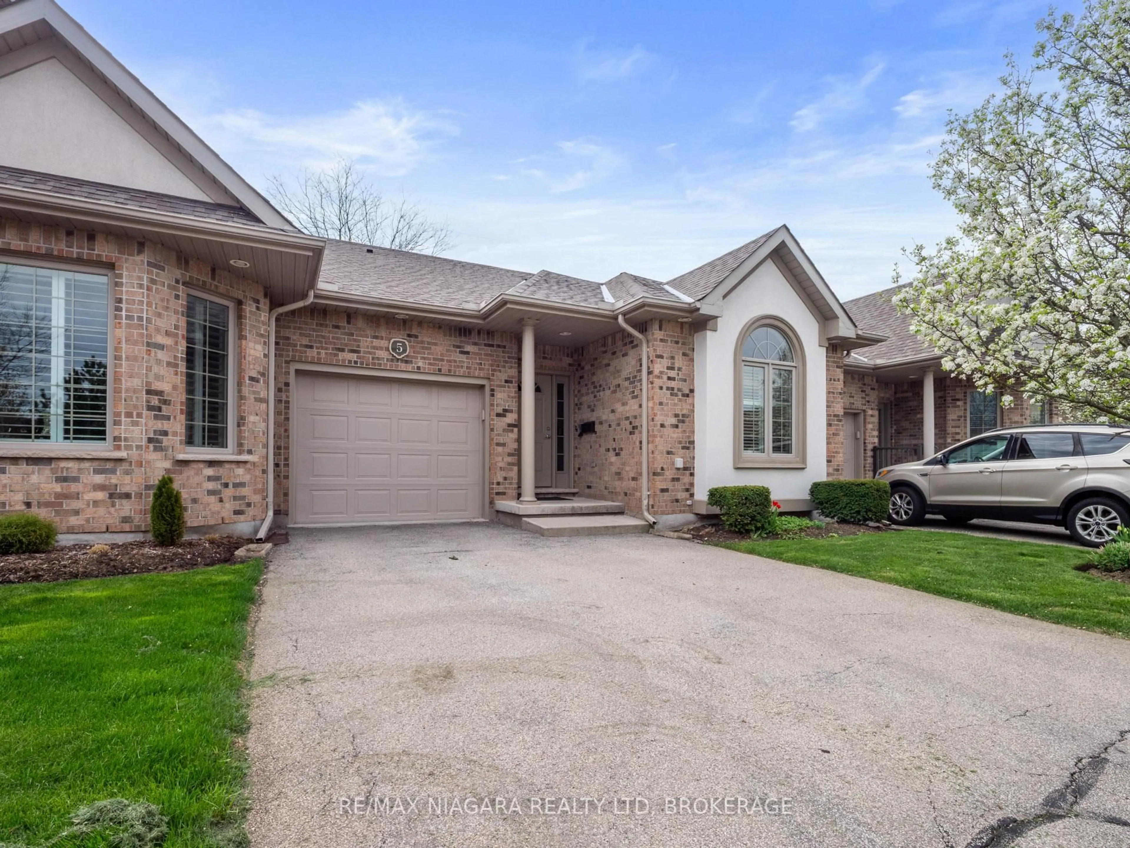 Home with brick exterior material, street for 4291 Montrose Rd #5, Niagara Falls Ontario L2H 1K1