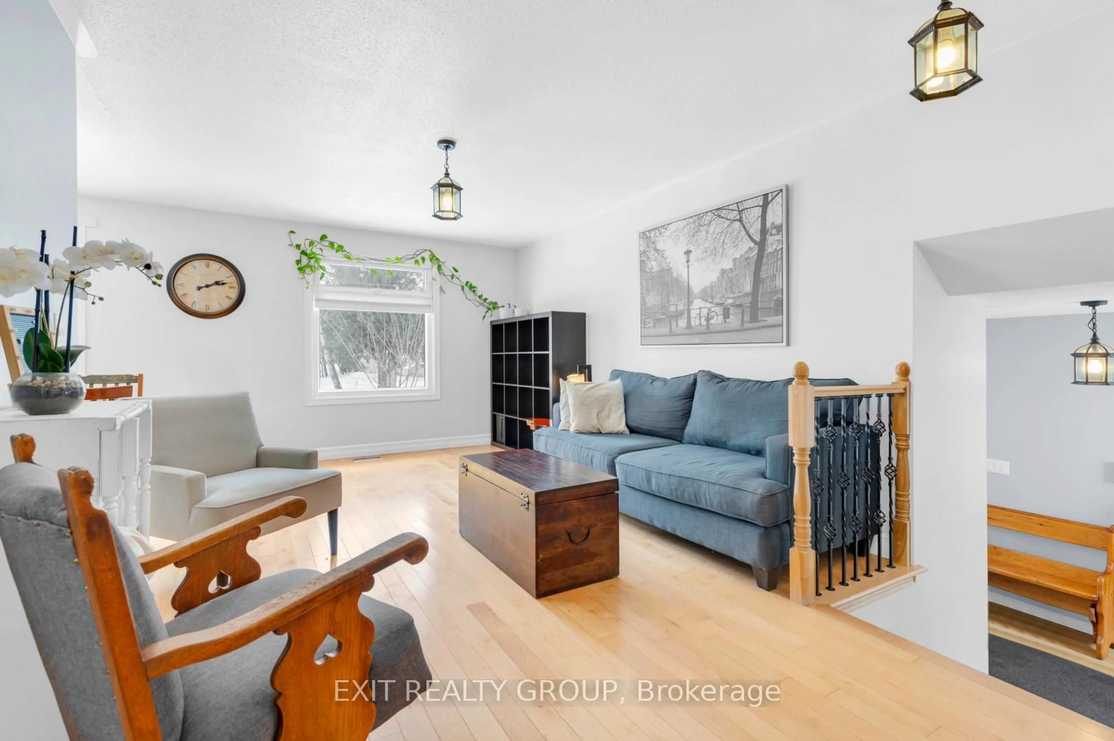 Living room with furniture, wood/laminate floor for 96 Maple Dr, Belleville Ontario K8P 2R2