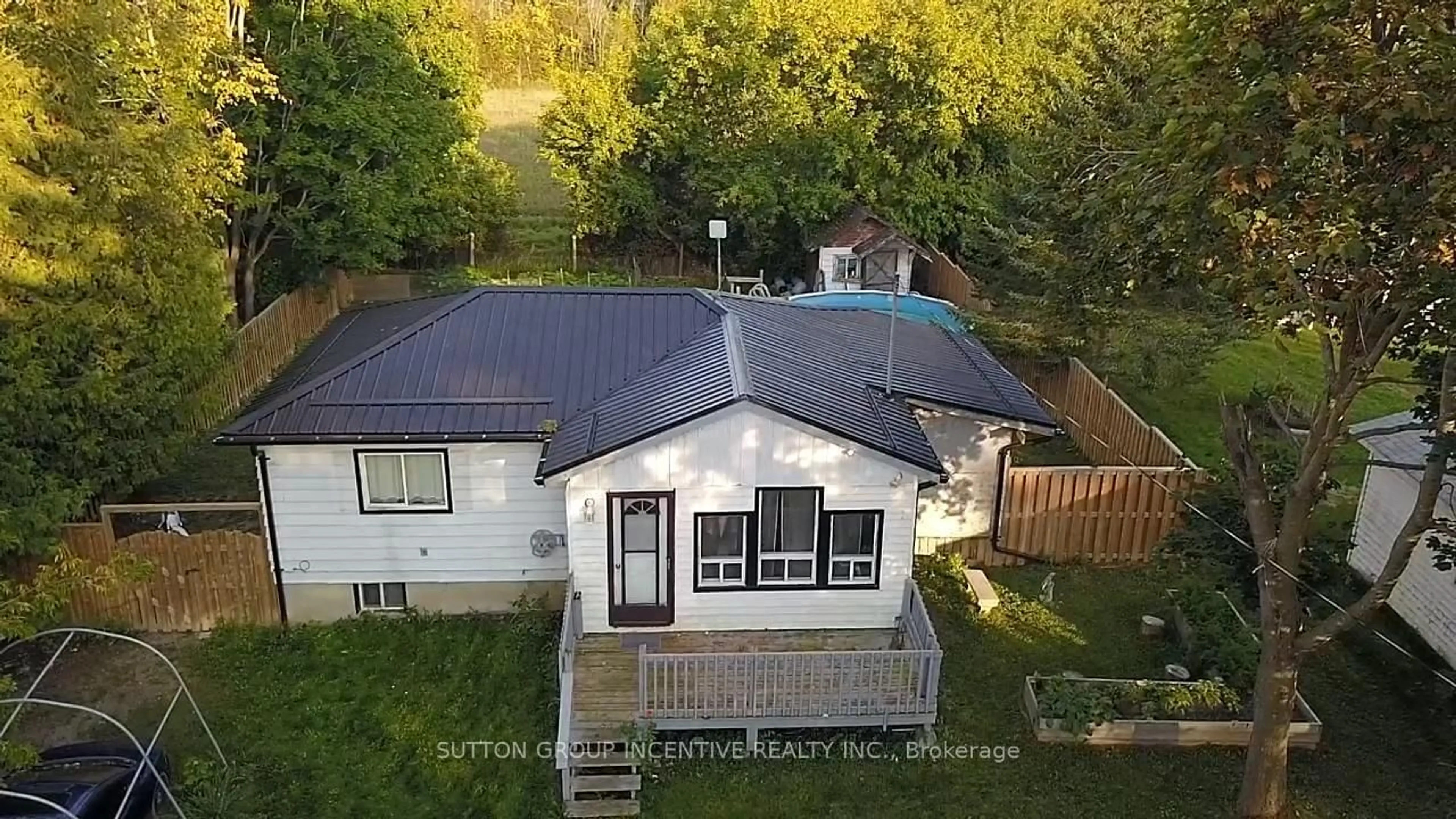 A pic from outside/outdoor area/front of a property/back of a property/a pic from drone, unknown for 26 Laird Dr, Kawartha Lakes Ontario K9V 4R6