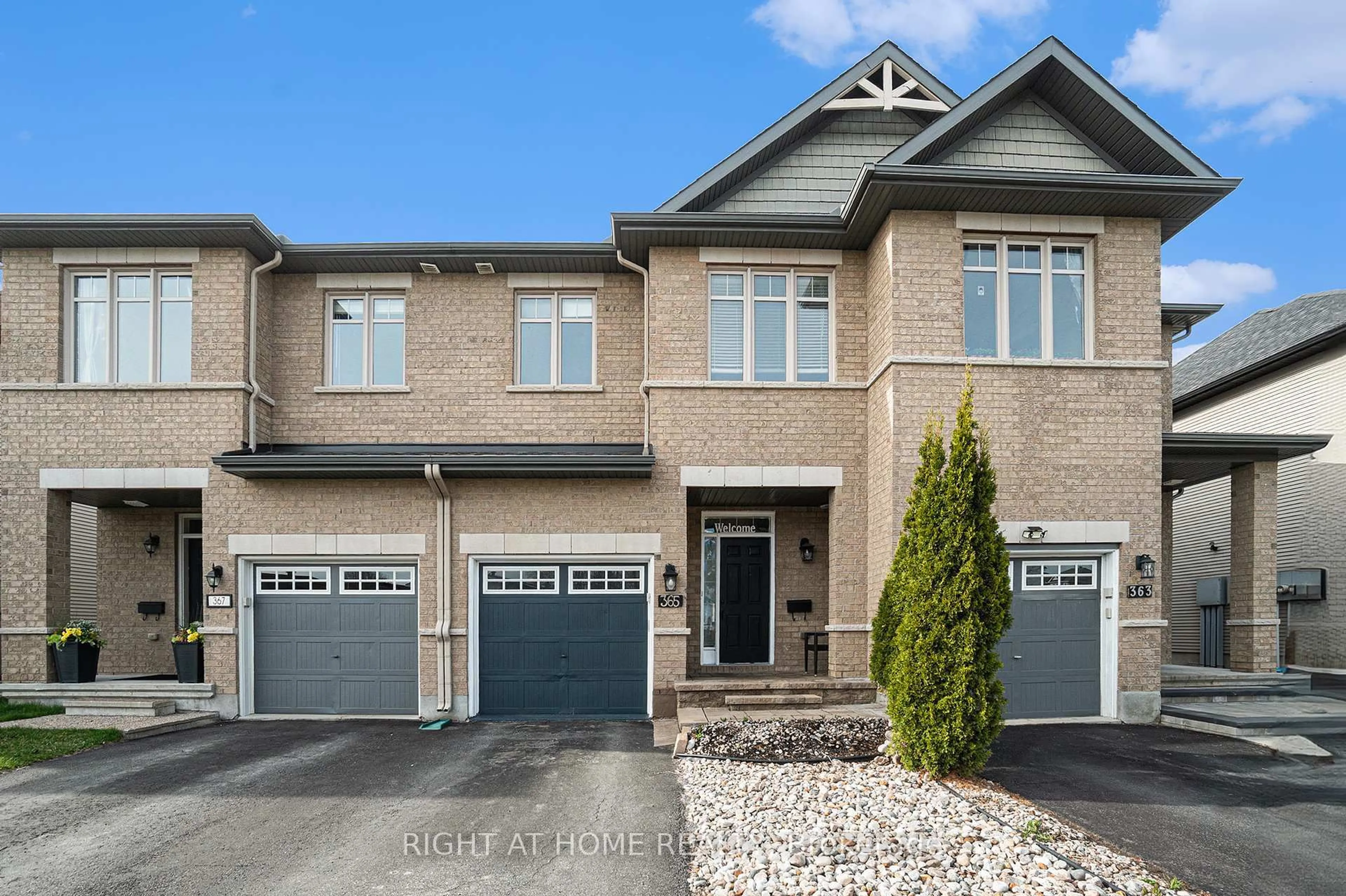 Home with brick exterior material, street for 365 Trailsedge Way, Ottawa Ontario K1W 0G7