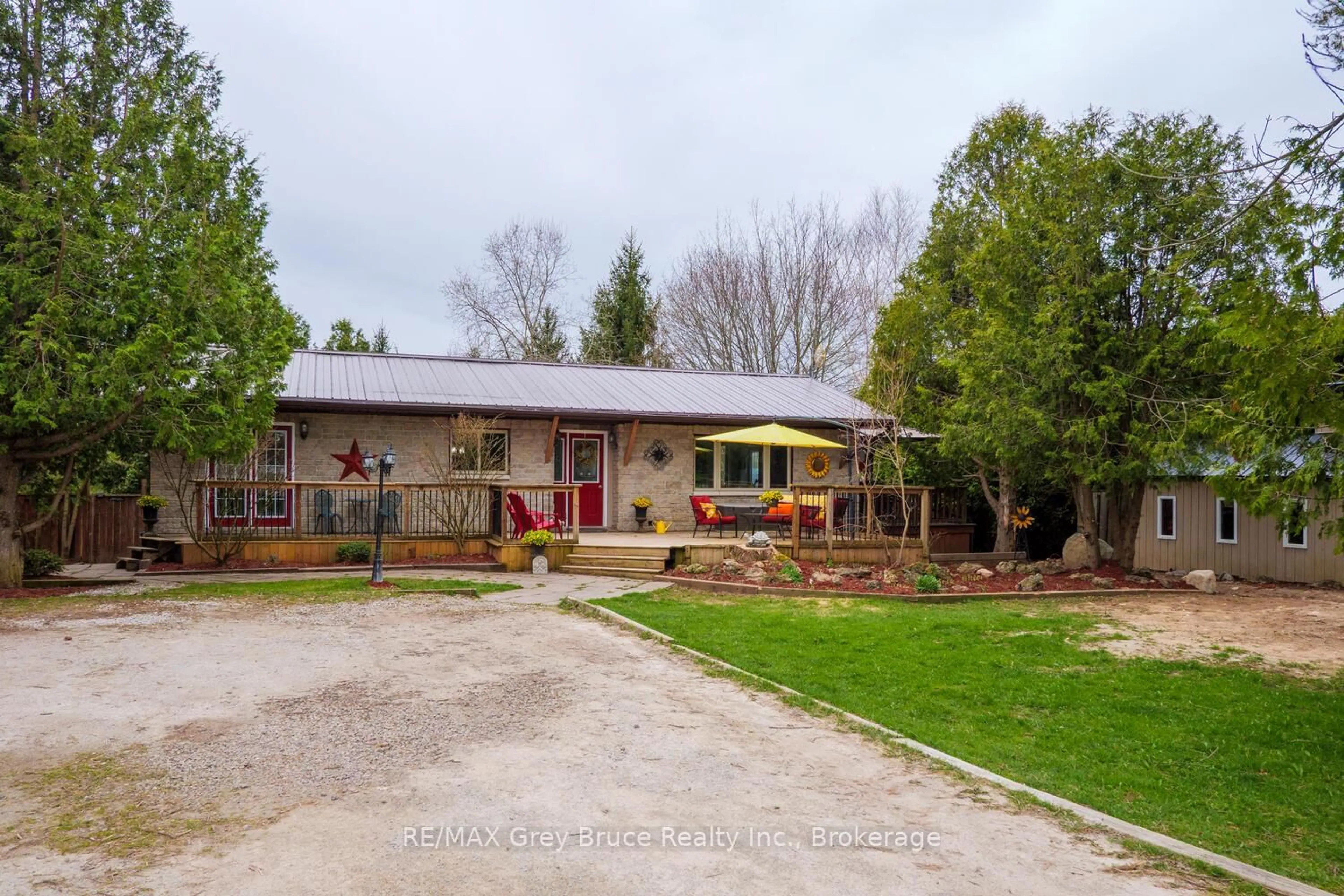 A pic from outside/outdoor area/front of a property/back of a property/a pic from drone, street for 106 Elder Lane, Chatsworth Ontario N0H 1G0