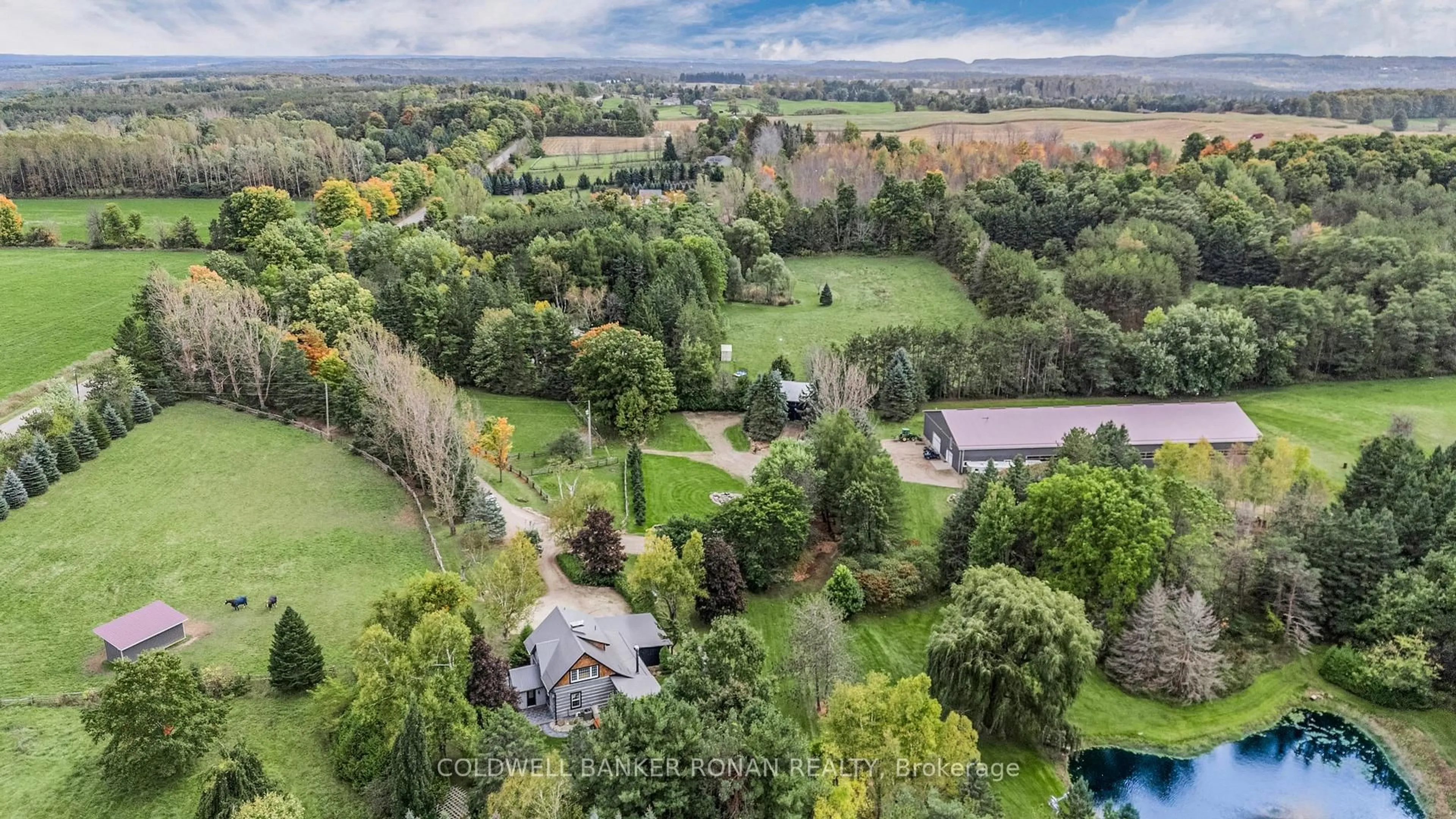 A pic from outside/outdoor area/front of a property/back of a property/a pic from drone, water/lake/river/ocean view for 836138 4th Line, Mulmur Ontario L9V 0J1