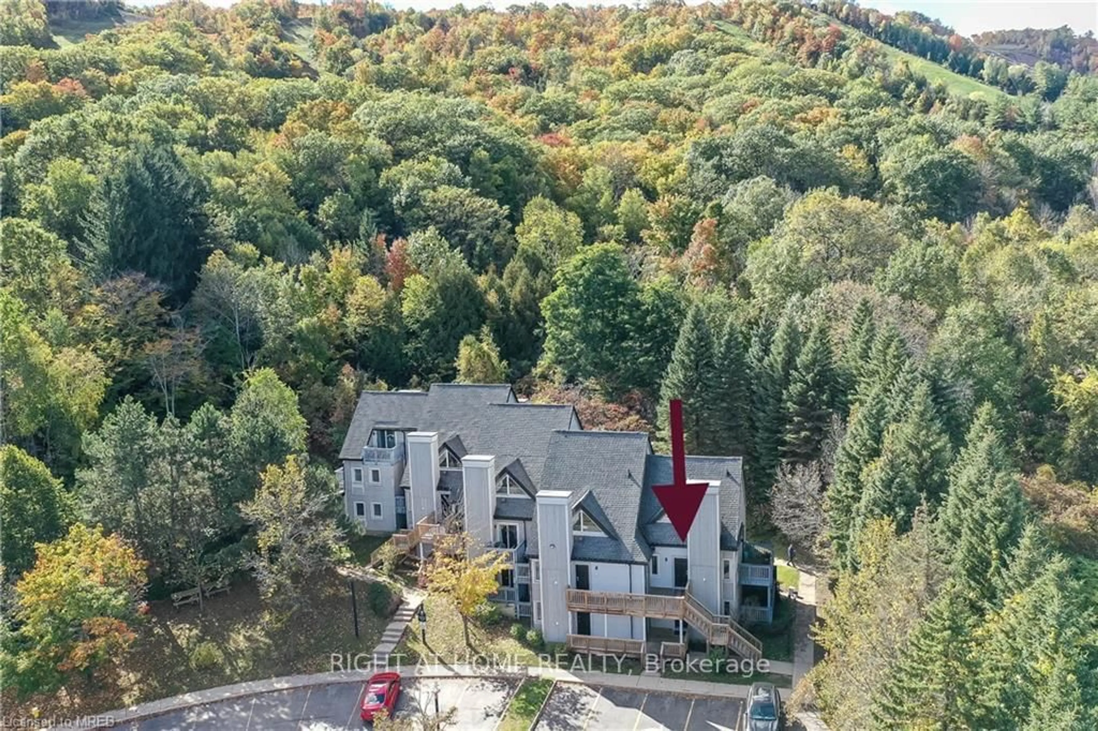 A pic from outside/outdoor area/front of a property/back of a property/a pic from drone, unknown for 796468 Grey 19 Rd #909, Blue Mountains Ontario L9Y 0N6
