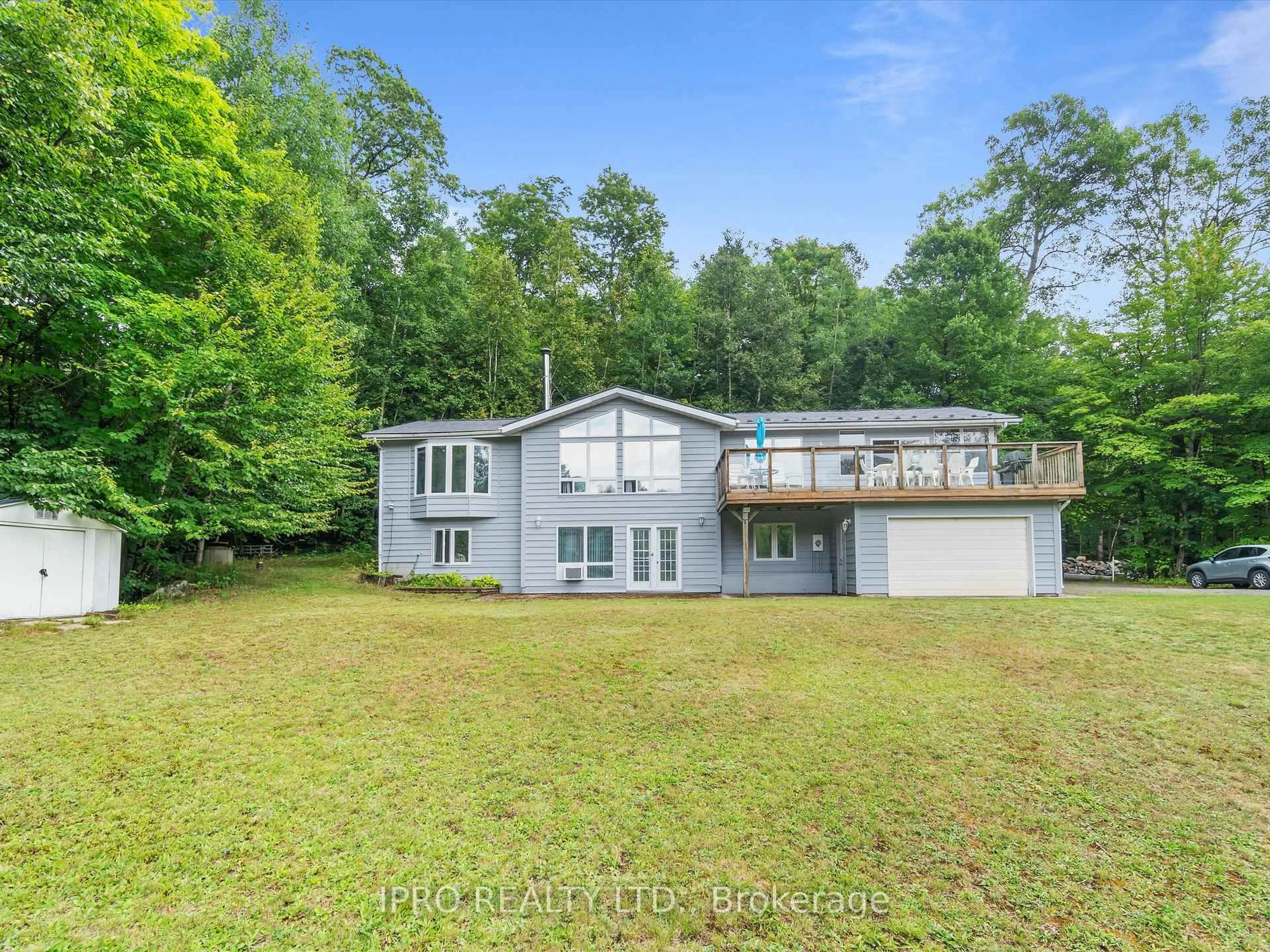A pic from outside/outdoor area/front of a property/back of a property/a pic from drone, water/lake/river/ocean view for 6 Lower Lane, Seguin Ontario P2A 2W8